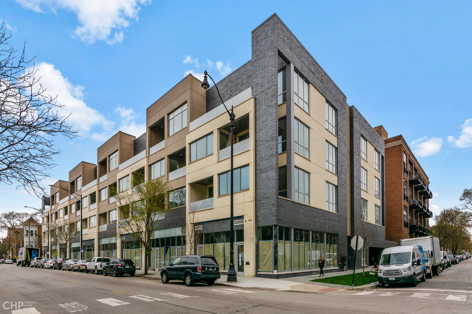 2 BED/2 BATH-Logan Square: BUILDING AMENITIES:  Gym, Common Party/Business Room, 1 HEATED Garage parking spot included ,storage locker, package/mail room,  intercom. Hot Water, water, trash/recycling, snow removal included. Tenant pays electric, gas, cable/internet.     APARTMENT AMENITIES: Stainless steel appliances, Quartz counter tops, Electric fireplace, Window treatments, Balcony/Outdoor space, modern floors, Walk in closets, In unit washer/dryer.     Sophisticated open floor plan with a spacious living area. The master bedroom showcases a large walk-in closet with custom built organizers, perfect for any size wardrobe. Master bathroom has a dual vanity and luxurious shower. The other bedroom is spacious and has a walk in closet with organizers built in. The guest bathroom includes a tub and shower. Lastly, there are modern floors throughout, complimented by many windows which allows for ample sunlight with a balcony ideal for outdoor relaxing.     Unit is walking distance to Logan Square restaurants coffee shops etc. Easy 90/94 highway access. Unit is close to public transportation- CTA Blue line and 606 walking trial. Designated Managing Broker is related to the owner.  Photos are from similar unit in the building.