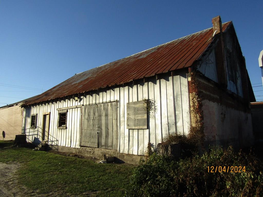 2,204 sq ft warehouse located in downtown Pelham. This would be perfect for storage or business overflow with a little TLC. The building sits on a sturdy concrete slab, and the surrounding buildings have been recently restored.
