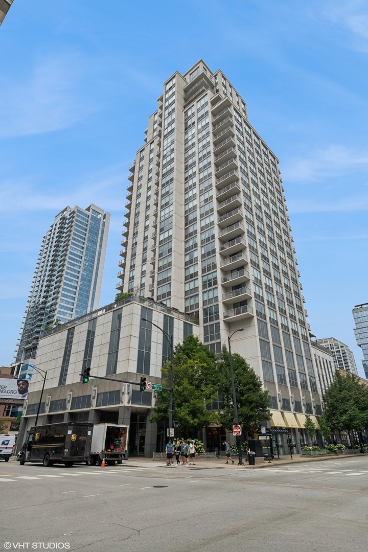 Stunning 2-bedroom, 2-bathroom corner residence now available in River North. As you walk in you will immediately notice the extra-high ceilings and gleaming hardwood floors. The galley kitchen is equipped with granite countertops and stainless steel appliances including a microwave and dishwasher replaced in 2025. The unit also includes an in-unit washer/dryer (2019). Most of the light fixtures were updated in 2023 to add to the home's modern vibes. Since it is a corner unit it gets an abundance of natural light and sweeping city views, making every room feel bright and inviting. Both of the bedrooms are spacious and the primary has its own ensuite bathroom along with a walk-in closet. Additionally, the location can not be beat. Commuting is easy with access to CTA trains, buses, and expressways nearby, while the Riverwalk, Michigan Avenue, Chicago's best dining, nightlife. and Loop are just steps away. Come see it before it's gone!