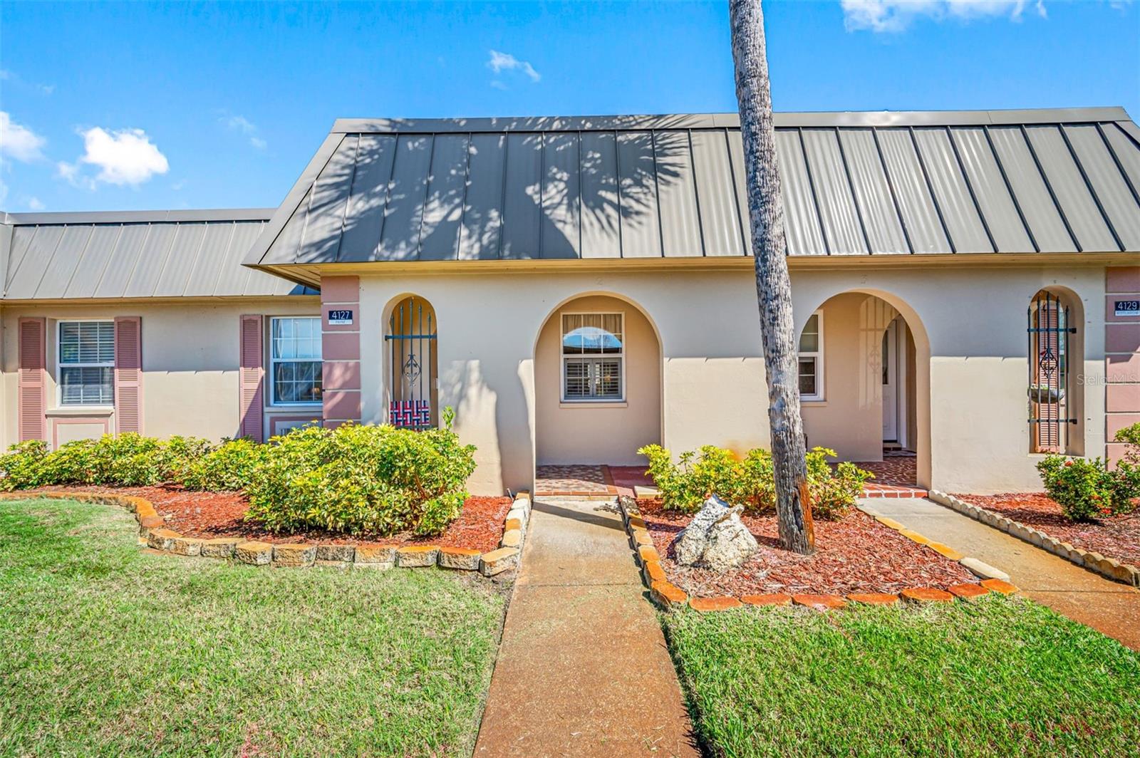 Enjoy the breathtaking, peaceful water view every day in a resort style 55+ community!  Gardens at Beacon square is a meticulously maintained community offering amenities to include a clubhouse, library, pool table, gathering room, heated pool, dock, shuffleboard, social activities and much more.  If you enjoy fishing; you'll love having the opportunity to catch Snook, Tarpon, Redfish and even Blue Crab right in your new backyard! This spotless home is located in a premium position in the community as it's on a quiet cul-de-sac, overlooking wide water views, and covered parking steps from the front door. Upon entering, you will be greeted by an awe inspiring waterfront views through the updated window, the large welcoming bedrooms and an updated bathroom. There are many opportunities close by to include shopping, restaurants and medical facilities.  There's an easy commute to beaches, parks and the Tampa International Airport.  Association fees include cable, internet, water, trash, insurance, escrow reserves and building & grounds maintenance.  There is a one time capital contribution of $1,000.