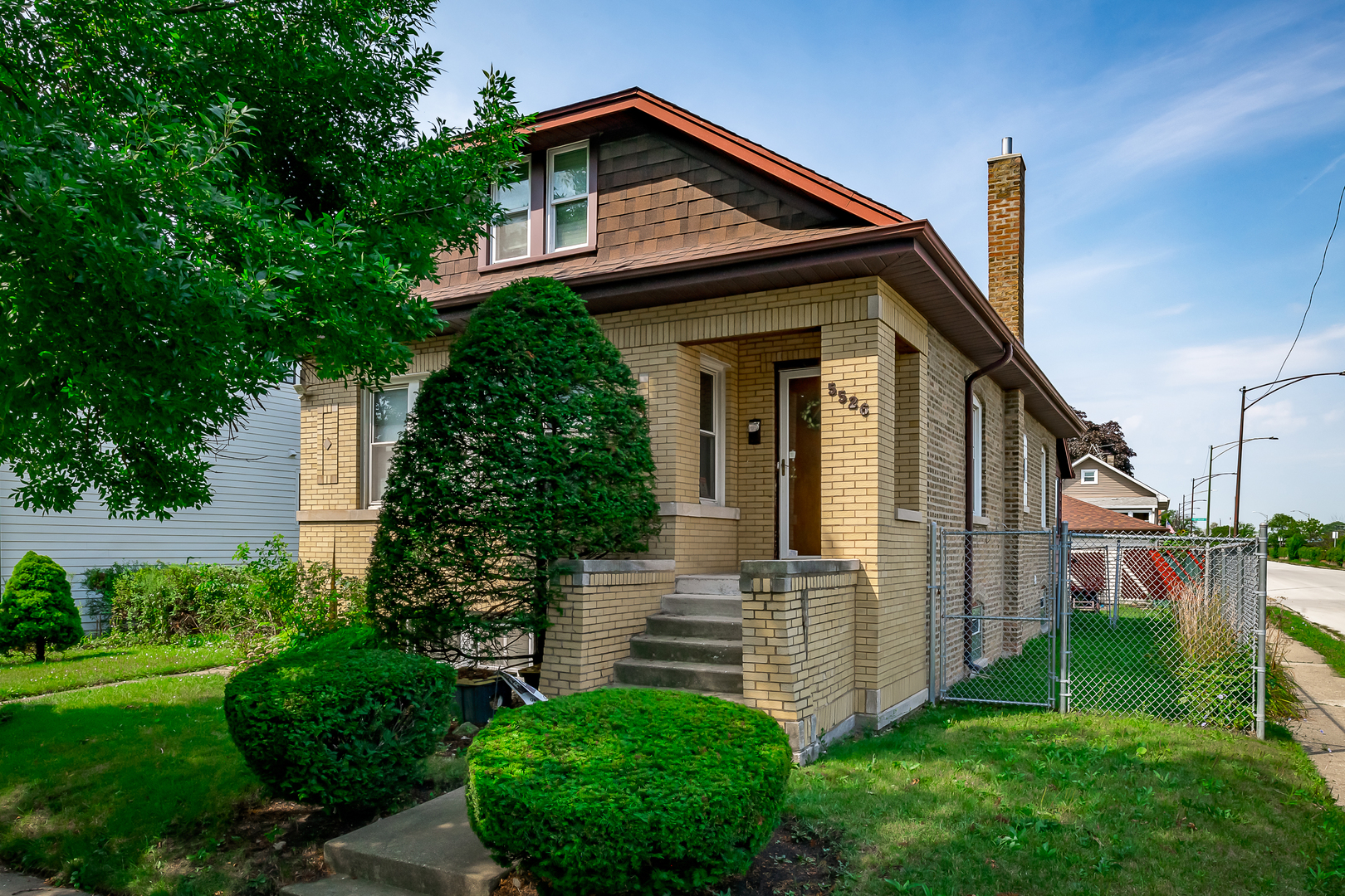 Welcome to this charming 3-bedroom, 2-bath home situated on an oversized 50x175 lot in the highly desirable Norwood Park neighborhood. The sun-filled living room features large windows and a cozy fireplace, flowing into a spacious dining room and a well-equipped kitchen with ample cabinet space. A flexible bonus room off the kitchen overlooks the deep, lush backyard-ideal for an office, playroom, or sitting area. The main level includes one bedroom and a full bath, while the upper level offers a second bedroom and extra storage space. The unfinished basement provides incredible potential with a third bedroom, second full bath, spacious rec room, office area, laundry, and abundant storage. Outside, enjoy a large backyard perfect for relaxing or entertaining, plus a 2-car detached garage, parking pad, and converted storage garage. Located near the Metra, I-90/94, Mariano's, Edison Park, and public transportation, this home combines space, comfort, and unbeatable convenience.
