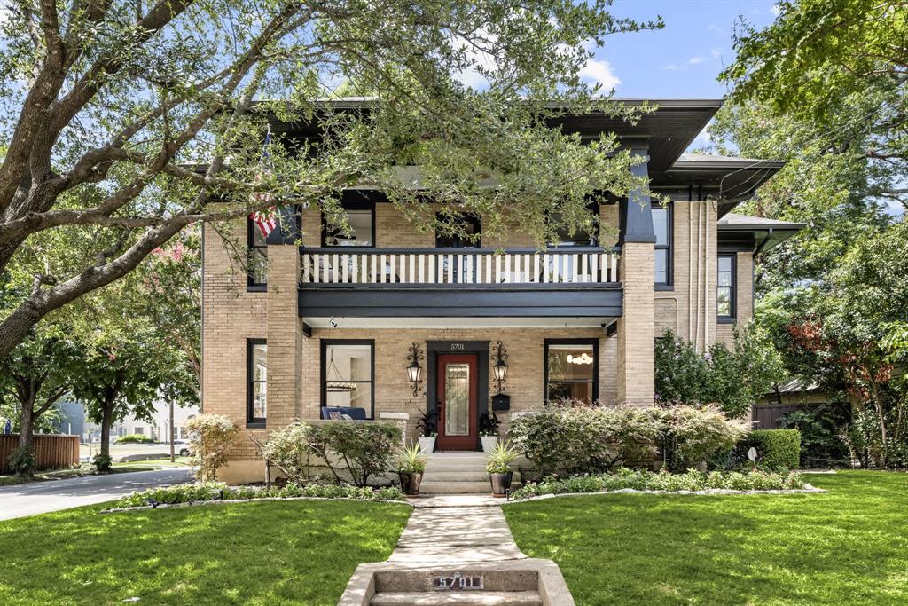 Standing tall and proud on its generous corner lot in Junius Heights since 1922, 5701 Worth exudes a quiet, stately confidence - light, bright and timeless. Inside, natural light floods each room and compliments the historic details within - from the ornate stair banister that greets guests in the foyer to the moldings and oak hardwoods that are enjoyed throughout the home. Meticulously refreshed - the kitchen is both distinct and practical. Warm oak cabinetry and the statement vent hood pair perfectly with quartz countertops and the waterfall island; But it's the marble tile backsplash that emboldens the design with personality and edge. Additionally, the chef of the house will take full advantage of the industrial grade 6-burner range, pot filler and separate wine fridge. The primary suite is expansive and enjoys an enormous closet that was re-designed to give its own access to the large utility room. The primary bathroom is wrapped with windows in the private back corner of the home. This ensuite is giving “estate spa” vibes and is outfitted with an over-sized frameless glass shower and double vanity. Not to be outdone, the secondary bedrooms are also generously sized. And their bathrooms? Hello, vintage clawfoot tubs. Swoon! But what really sets this home apart is how it lives. The screened-in porch delivers. The sun room is an idyllic situation to work from home. And there is no better way to start your day than on the stately second-story balcony. Out back? You’ll love the massive yard. 5701 Worth exudes confidence that comes from integrity built over a century. Unbothered by passing trends but now infused with new life, this home has always been in style and remains an iconic presence in the beloved Junius Heights Neighborhood.