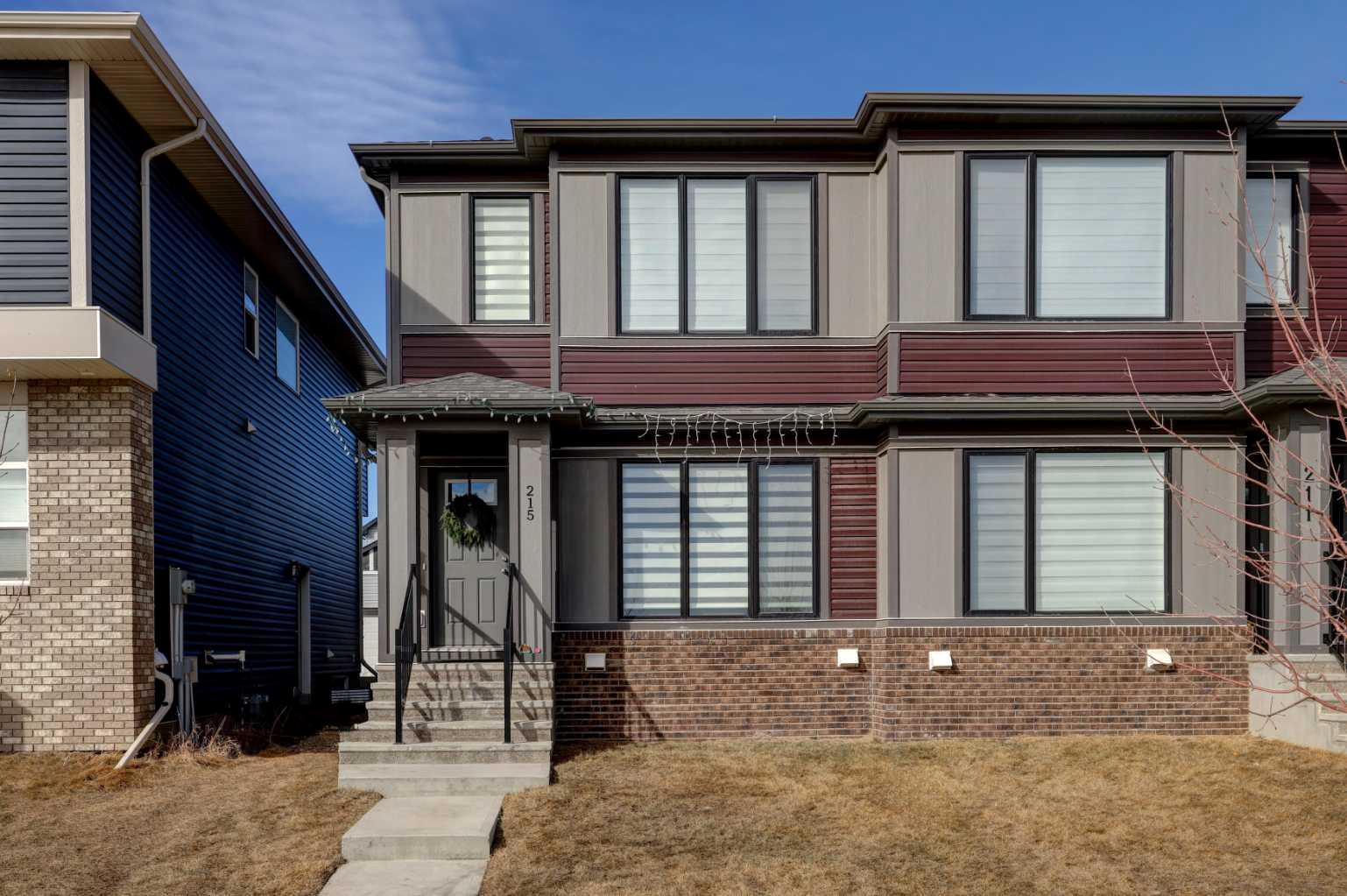 Welcome home to this beautiful and peaceful 3-bedroom family half-duplex, ideally located facing a large park and just steps away from incredible community amenities. Enjoy easy access to a splash park, skate park, and ball diamonds—perfect for active families and outdoor living.This move-in ready home offers a bright open-concept main floor, designed with both comfort and functionality in mind. The stylish kitchen features elegant quartz countertops, a spacious dining area, and sleek stainless steel appliances, including an electric stove, built-in microwave, and dishwasher—perfect for everyday living and entertaining.Upstairs, the generous primary bedroom includes a private ensuite and a full walk-in closet. You’ll also love the convenience of upper-level laundry, making busy family life that much easier. Two additional bedrooms are thoughtfully set apart from the primary suite, offering added privacy for family members or guests.The basement comes with a separate back entrance and is ready for your future plans, complete with plumbing and laundry rough-ins.To top it all off, this home includes a double detached garage, providing ample parking and storage space.This is a fantastic opportunity to own a stylish, functional home in a vibrant, family-friendly location—don’t miss it!