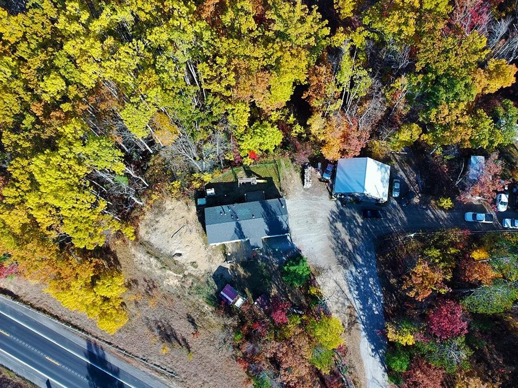 Cozy Up North Retreat on 5.23 Acres! Enjoy peace and privacy with this 3-bedroom, 2-bath home nestled among mature trees and rolling terrain-perfect for outdoor enthusiasts and hunters alike. The property features a partially finished 30x40 pole barn with a steel roof and cement floor, offering plenty of space for storage, hobbies, or future projects. Home needs a little TLC but has tons of potential to make it your own up north escape. Conveniently close to Federal land across the road and within walking distance from the property. Located near Island Lake and Loon Lake. Close to ATV and snowmobile trail systems for year-round adventure. Dont miss this opportunity to own your own slice of northern paradise!