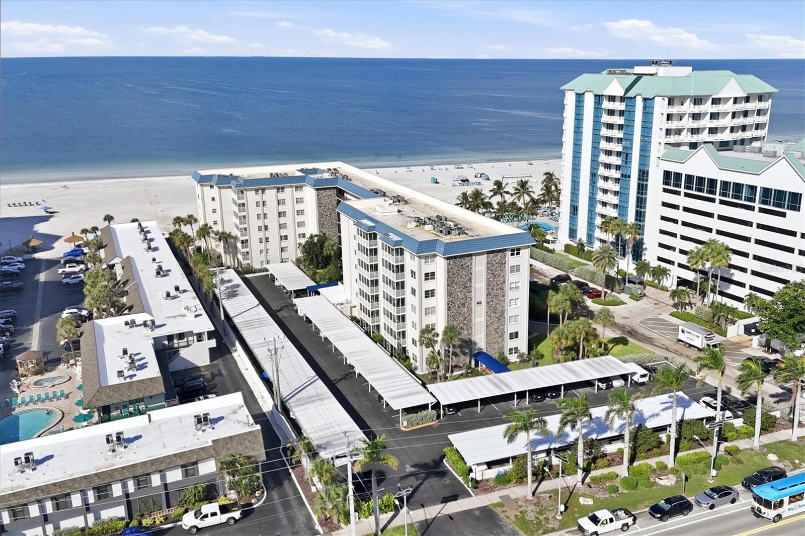 An exceptional opportunity to own directly on Lido Beach at a price point rarely associated with a water-view residence in this coveted island location. Lido Ambassador puts the Gulf of Mexico at your doorstep, with resort amenities next door, St. Armands Circle nearby and the island trolley just steps away—making it easy to enjoy the best of Sarasota’s beach lifestyle. Located on the southwest corner of the building, #501 enjoys beach views from the south-facing windows and balcony, along with a peek-a-boo view toward Big Pass. Additional windows in the primary bedroom welcome natural light and morning sun. Inside, consistent tile flooring creates an easy flow throughout, while the split-bedroom floor plan provides privacy for owners and guests. The layout also offers the option to add an in-unit washer and dryer. Lido Ambassador is a secure Gulf-front building with assigned parking and a distinctive position as the first beachfront condominium on Lido Key, immediately south of the Lido Beach Resort. Spend the morning on the sand, walk or trolley to St. Armands Circle for lunch, then come home to your own place on Lido Key. For buyers looking for water views, an exceptional location and compelling value, #501 deserves a closer look.