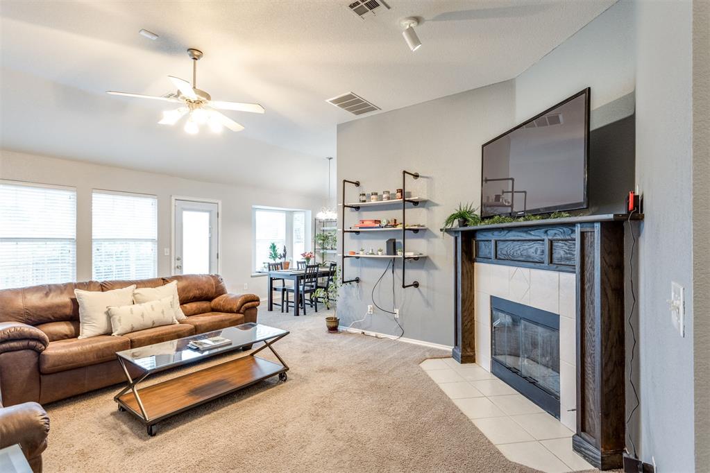 5.125% assumption with qualified buyer!  Move-in ready home in Moore, OK — ideally located in the Oklahoma City metro, just minutes from Norman and with quick access to I-35. Enjoy effortless shopping and dining on both the east and west corridors.Inside, a simi open-concept living room welcomes you with a wood-burning fireplace, classic mantel, and built-in industrial-style shelving that conveys with the home. Natural light fills the space, with views to the fenced backyard and patio.The kitchen offers ample cabinet storage, and added shelving.— with generous counter space ideal for everyday cooking or weekend entertaining.The spacious primary suite features a private en-suite bathroom and two walk-in closets. Every detail has been thoughtfully maintained and cared for — this home is truly move-in ready.Step outside to your private patio and fully fenced backyard, perfect for pets, kids, or relaxing evenings. A neighborhood park is within walking distance, making this an ideal location for families.Key features: Fireplace ; Walk-in closets; Fenced backyard ; Covered patio ; semi-open floor plan ; Moore, OK ; Near Norman ; Oklahoma City metro ; I-35 access