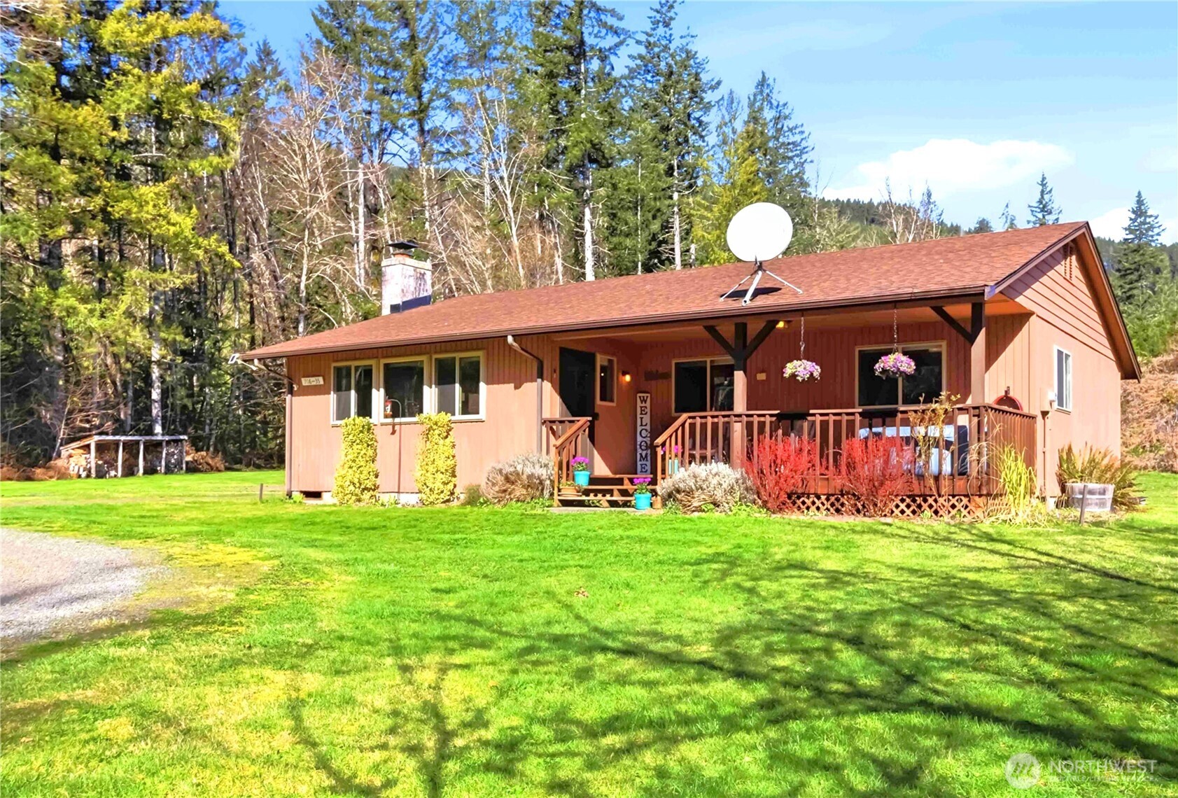 Cascade Mountains Dream Getaway – Move-In Ready 2 Bed, 2 Bath Home on 2.64 Acres! Welcome home to this clean and cozy, carefully maintained 1,289 sq ft mountain cabin on a quiet dead-end road, where pride of ownership shines through, perfect for anyone seeking a simple, self-sufficient lifestyle. Surrounded by peaceful woods and open spaces, this property backs up to Port Blakely land and offers the peace and privacy homesteaders crave. Featuring a spacious living room, Primary bed with ensuite bath, space-maximizing pantry, Trane heat pump, Leaf-Guard gutters, and a wood-burning fireplace that warms the whole space. Triple pane windows ensure maximum energy efficiency. Roofs on house and outbuildings replaced in 2017. A beautiful year-round Salmon spawning creek marks the Western property line, easily accessed by a tranquil, well-maintained forest trail. Ideal for growing and living off the land with a fenced garden, several varieties of fruit trees, greenhouse, and garden plot ready for planting. Detached garage with shed, carport and RV parking areas provide room for vehicles, tools, equipment, or small livestock needs. Unwind under the stars in the included soft-sided hot tub after a day working your land or just enjoying the nature around you. Well and septic in place. Close to Lake Scanewa, Cowlitz Day Use Park and endless outdoor recreation. A peaceful, grounded mountain retreat with true homestead or Air B&B potential (buyer to verify). Don't miss this opportunity!