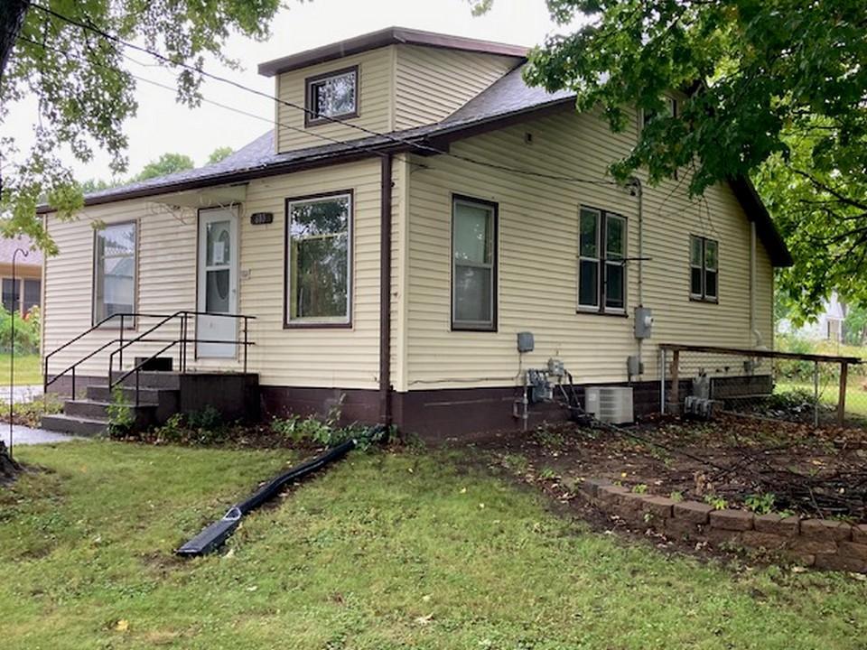 Charming home on large, wooded lot. 4 bedrooms with great cabinet and closet space. Also features nice dining room, wood floors, mud room entry, full bath, large double garage plus storage shed. Wonderful location is close to parks, golf, and retail locations. Great opportunity to get an affordable home that can be finished to your preferences.