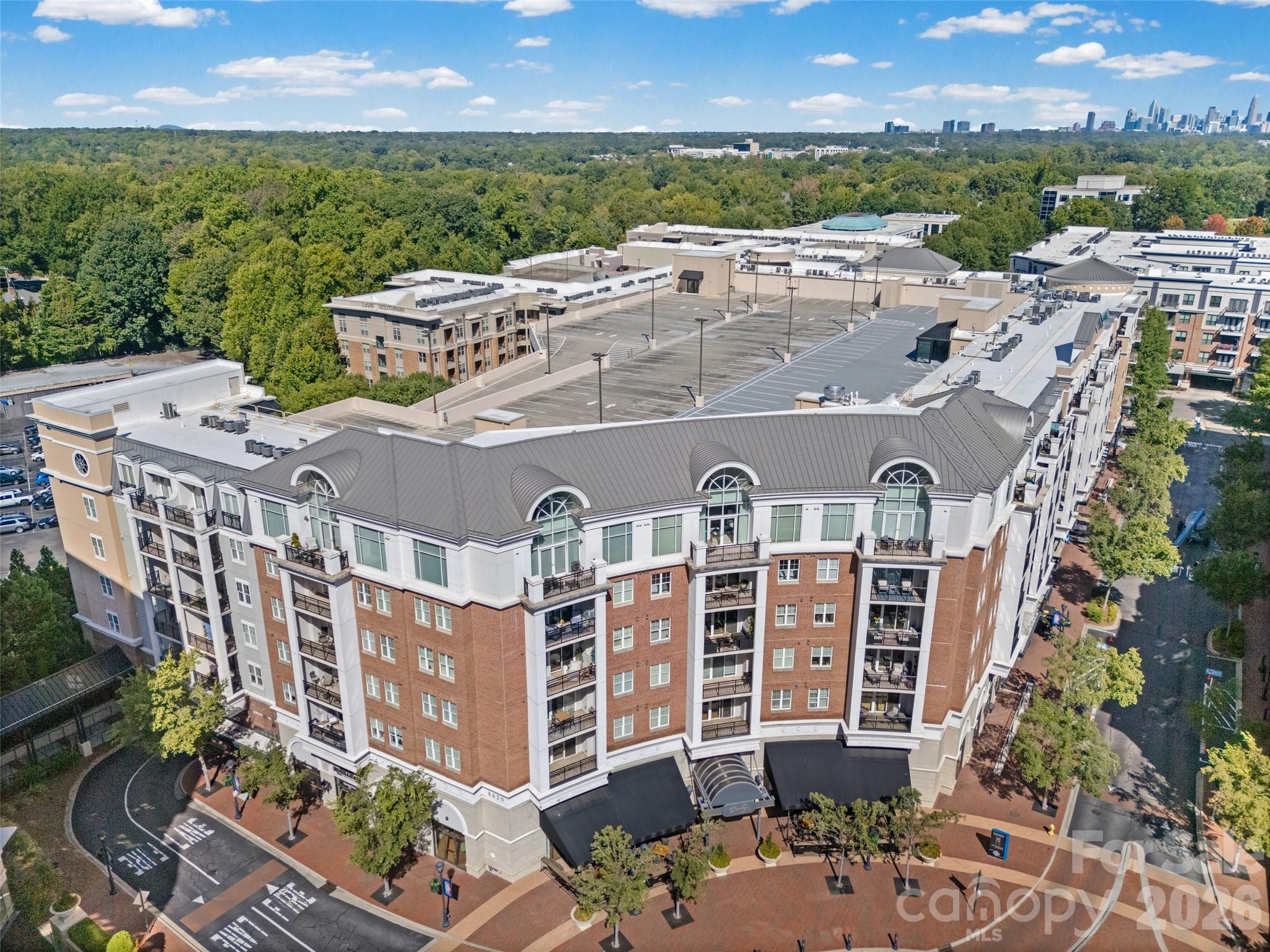 Welcome to Piedmont Row in the heart of SouthPark! This well-maintained 1-bedroom, 1-bath condo offers an open floor plan, spacious living area, high ceilings and a private balcony. The kitchen features granite countertops, stainless steel appliances and plenty of cabinet space, while the bedroom offers a generous walk-in closet. Recent updates include a new HVAC system, new water heater and new dishwasher, plus the unit includes an air purification system. Enjoy secure building access, elevator service and assigned parking, all within a convenient SouthPark location close to shopping, dining, entertainment and major roadways. Whether you're looking for a full-time home or investment property, this is an excellent opportunity to enjoy low-maintenance condo living in one of Charlotte's most desirable areas.