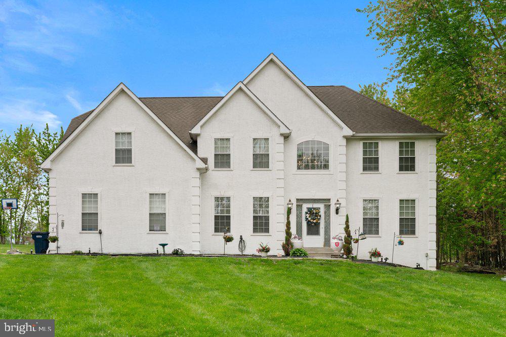 Welcome home to 32 Meadow Lane, a truly exceptional  residence set on 2.4 private acres in East Coventry, within the highly regarded Owen J. Roberts School District. As you pull up the long private driveway, you’re greeted by a beautifully transformed property featuring a 3‑car garage, all‑newer front windows, exterior paint, new garage motors, and metallic‑epoxy garage floor. The outdoor spaces is equally impressive, with two flagstone patios, a pergola, extensive tree removal, and full yard regrading for ideal drainage. Inside, the home offers a fully finished basement with a large two‑tier custom bar, a built‑in fish tank under the stairs, a bathroom and a dedicated movie theater with a motorized dropdown screen and high‑end surround sound. The second floor showcases a luxurious expanded primary suite featuring a three‑head walk‑in shower with a fish‑tank niche, a whirlpool tub, dual vanities. Bluetooth‑enabled color‑changing fans, followed by three additional spacious bedrooms offering comfort and versatility for family or guests. Every room has been updated with flooring, paint, upgraded trim, new closet doors, and fully automated smart lighting compatible with Alexa and Google Assistant. The kitchen showcases high‑end Woodmark Supreme cabinetry, custom granite countertops, newer appliances, and upgraded lighting throughout. Major systems have been modernized with a 80‑gallon water heater, well tank, well pump, whole‑house UV filtration, a propane furnace, and cleaned ductwork. With California Closets in the primary suite, upgraded electrical throughout, and thoughtful enhancements in every corner, this home offers an unmatched blend of  technology, and comfort on a serene, expansive lot. 1 Year home warranty included.