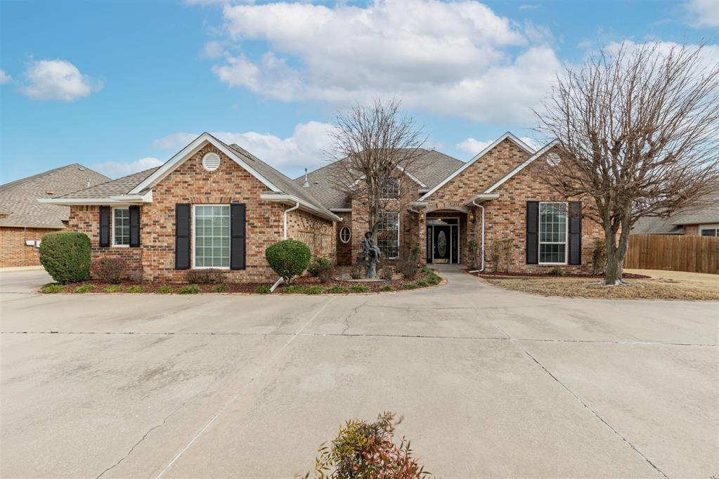Spacious and full of potential, this single-level home is located in the desirable, gated Fenwick Addition in Edmond—offering both privacy and peace of mind. Featuring a circle drive and a 3-car garage, this home offers excellent curb appeal and ample parking. With 3,225 square feet, this thoughtfully designed split floor plan features 4 bedrooms, 3 full bathrooms, and a dedicated office complete with beautiful built-in bookcases. Tall ceilings and abundant natural light create an open, airy feel throughout, while the large living room with a fireplace serves as the perfect gathering space.The flexible layout is ideal for a mother-in-law suite or dual primary setup, with a huge primary suite featuring a generous en-suite bath that includes double vanities, a soaking tub, separate shower, and walk-in closet. Three additional bedrooms and two full baths are located on the opposite side of the home, offering excellent privacy. The open kitchen and breakfast area overlook the backyard and lead to a covered patio—perfect for relaxing or entertaining. The home also includes a sprinkler system, to help keep the yard looking its best. Fenwick Addition residents enjoy access to a community pool, walking trails, and scenic neighborhood ponds, all while being conveniently located near top-rated schools, shopping, restaurants, and major highways. Priced with room for updates, this home presents a fantastic opportunity to personalize and make it your own in one of Edmond’s most sought-after neighborhoods.