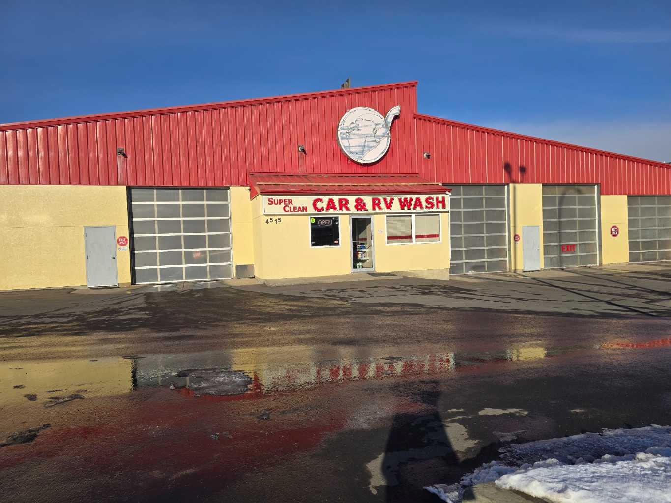 Located in a high-visibility, high-traffic area of Red Deer, this established car wash offers exceptional accessibility from major arterial roads and benefits from steady traffic drawn from nearby residential neighborhoods, commercial zones, and industrial parks. The property features ten barn-style bays, one automatic bay, and three large truck bays within a 12,363 sq. ft. building, with additional space reserved for a future automatic bay. Situated on 1.08 acres in the downtown commercial district, the site is surrounded by retail and office developments, as well as significant multi-family and hospital upgrade projects, ensuring strong long-term growth potential. Revenue ( 2023: $907,200, 2024: $923,896, 2025: $974,302)