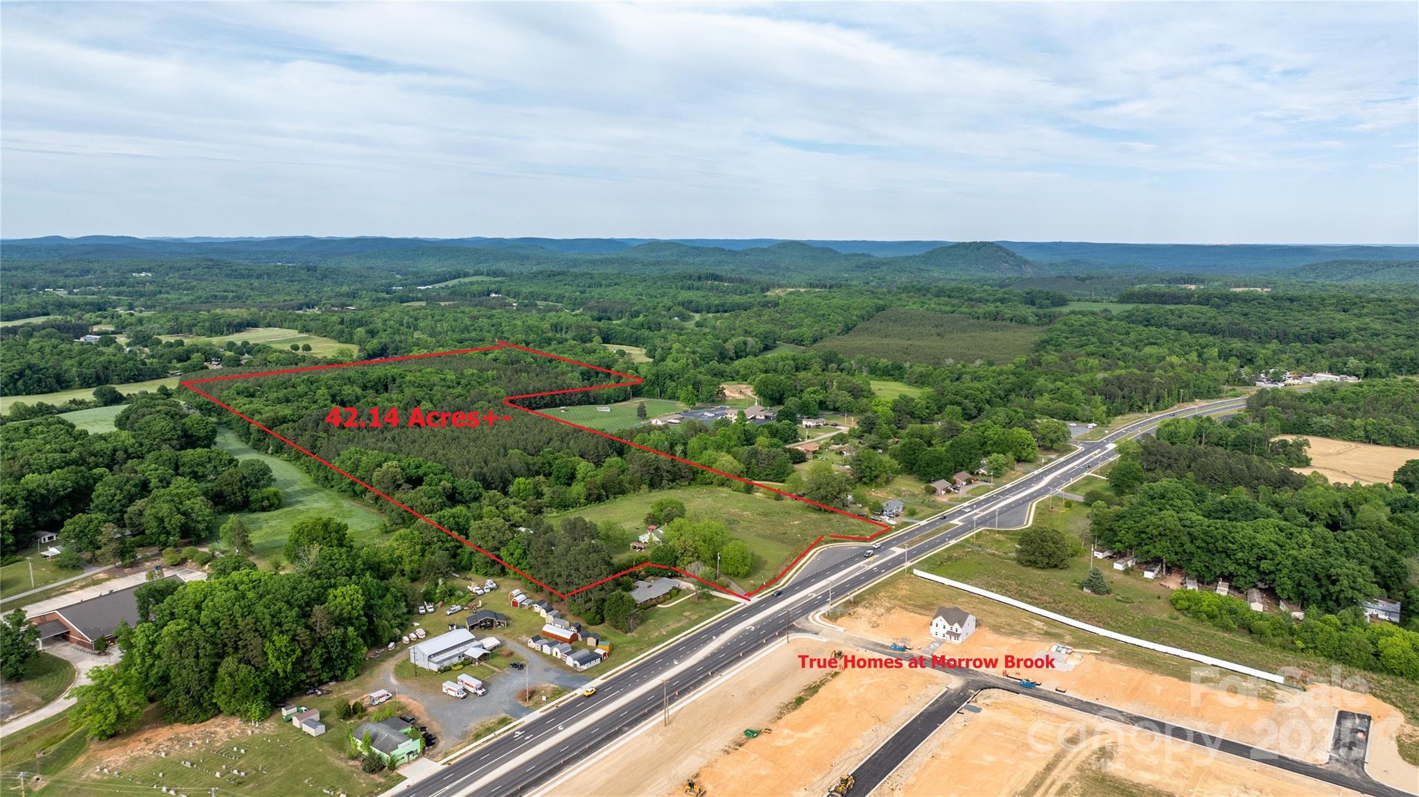 ATTENTION DEVELOPERS & INVESTORS — PRIME OPPORTUNITY!
Family-held farm now offered for sale! Ideal for residential development with annexation approval from the City of Albemarle. Across from Morrow Brook, a new True Homes subdivision now under construction.

42.14± acres across 3 parcels, sold together.

435± feet frontage on East Main St (NC Hwy 24/27/73).

1.77± acres city-zoned R-8 Residential.

40.37± acres county-zoned: 3.9± acres General Business, remainder R-A Residential Agriculture.

11.5± acres of 20+ year pines for immediate equity.

1012± feet paved frontage on Sweet Home Church Rd.

Albemarle and Stanly County are growing rapidly — seize this affordable development opportunity. MUST SEE — ACT NOW!