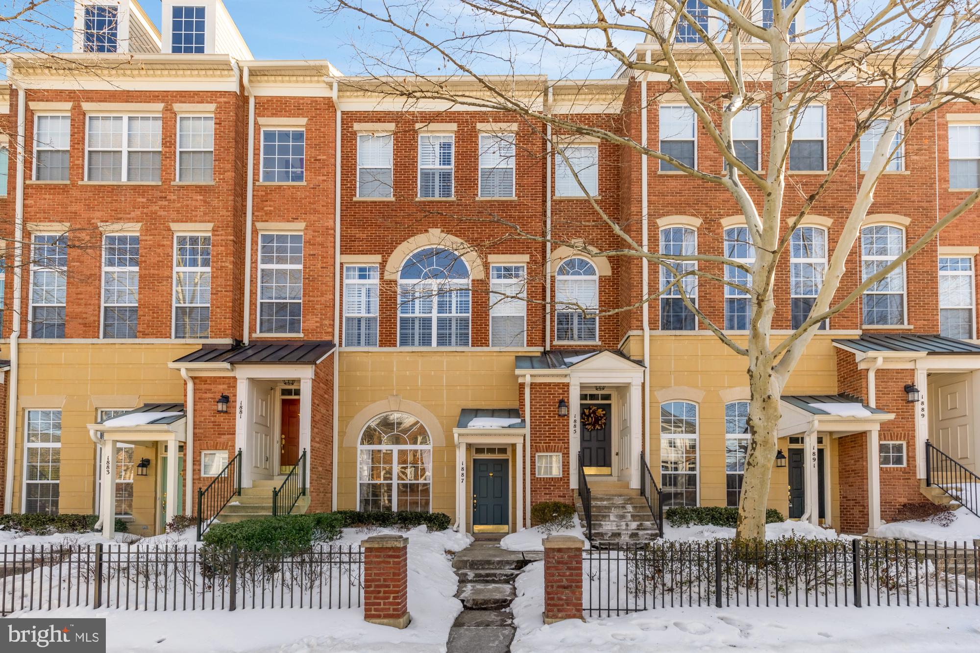 Bright, airy, and thoughtfully designed, this charming Reston residence offers comfortable living in a well-established community. Soaring ceilings and a dramatic arched window fill the main living area with natural light, creating an open and inviting atmosphere ideal for both everyday living and entertaining.The open-concept layout flows seamlessly from the living room into a spacious dining area and kitchen, featuring abundant cabinetry, generous counter space, and stainless steel appliances. The main level also offers convenient access to a private balcony—perfect for morning coffee or unwinding at the end of the day.The home has been thoughtfully updated with new flooring throughout (2023), including laminate flooring on the main level and new carpeting upstairs. Bathrooms were renovated in 2023, and the kitchen features recent appliance and lighting upgrades. Major system improvements include a new furnace and A/C installed in 2025, providing added efficiency and peace of mind.Upstairs, the primary suite serves as a peaceful retreat with a large walk-in closet and an updated en-suite bath. Additional bedrooms provide flexibility for guests, a home office, or workout space. A full-size in-unit washer and dryer, ample storage, and a functional, multi-level layout enhance everyday convenience.Ideally located near major commuter routes, shopping, dining, and Reston’s extensive trail system and amenities, this home offers the perfect blend of comfort, light-filled living, and accessibility.