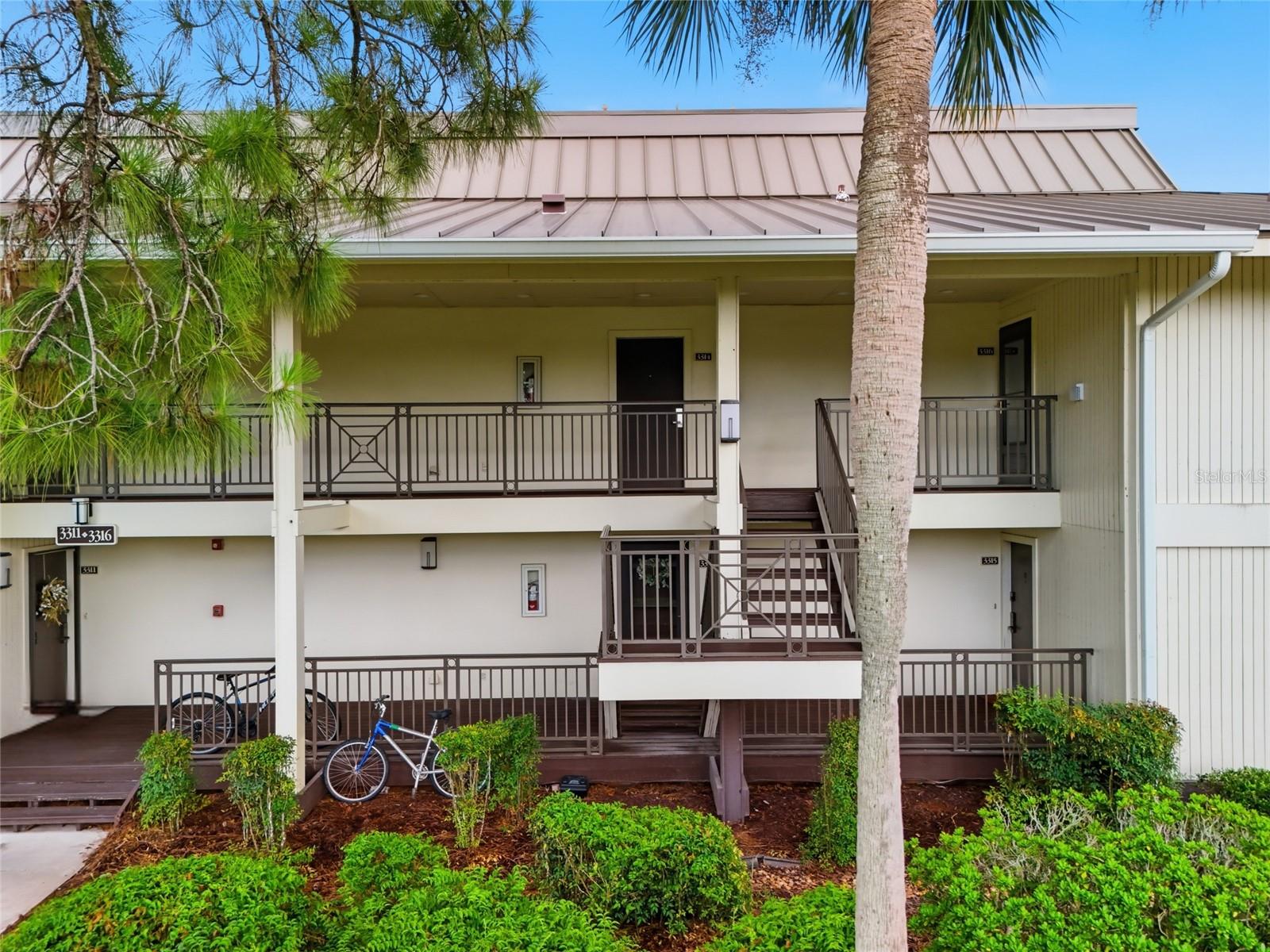 Imagine living at a resort year-round, where your days are filled with Florida sunshine, beautiful surroundings, and effortless living without the lawn work or weekend chores. Welcome to this exceptional second-floor 2-bedroom, 2-bath residence offering 1,400 square feet and one of Saddlebrook’s most desirable floor plans. This condo offers spacious living areas, excellent separation between the bedrooms, and an expansive balcony that creates a seamless extension of the indoor living space. The true showstopper, however, is the spectacular panoramic view. From your elevated second-floor setting, take in sweeping views across the peaceful pond, lush golf course, Lakeside Pool, Fitness Courts, and beautiful tropical landscape. The combination of shimmering water, manicured fairways, and lush surroundings creates a picturesque and serene backdrop from morning to night. The oversized balcony is the perfect place to enjoy morning coffee, evening cocktails, or simply unwind while taking in one of Saddlebrook’s most beautiful views. Whether enjoyed as a full-time residence, seasonal retreat, or investment property, this condo offers an exceptional combination of space, views, and low-maintenance resort living. Saddlebrook Resort is in the midst of an exciting $92 million transformation, bringing a fresh new energy to its iconic 480 acres of Florida paradise. Recent enhancements include Brew Café, the new Pool Bar & Kitchen, The Goal Sports Tavern, Rare 1981 upscale restaurant, beautifully renovated guest rooms, and a reimagined golf experience featuring three interchangeable nine-hole courses. The resort is also home to 43 tennis courts and 8 pickleball courts. The community offers 24-hour guard-gated security and an ideal location convenient to I-75, The Grove, The Shops at Wiregrass, Tampa Premium Outlets, dining, hospitals, and everyday conveniences. Optional memberships are available directly through Saddlebrook Resort for those who wish to enjoy golf, tennis, pickleball, spa services, dining, and additional resort amenities. Experience one of Saddlebrook’s premier second-floor floor plans, breathtaking panoramic pond and golf course views, and the rare opportunity to enjoy the feeling of a luxury resort every day of the year.
