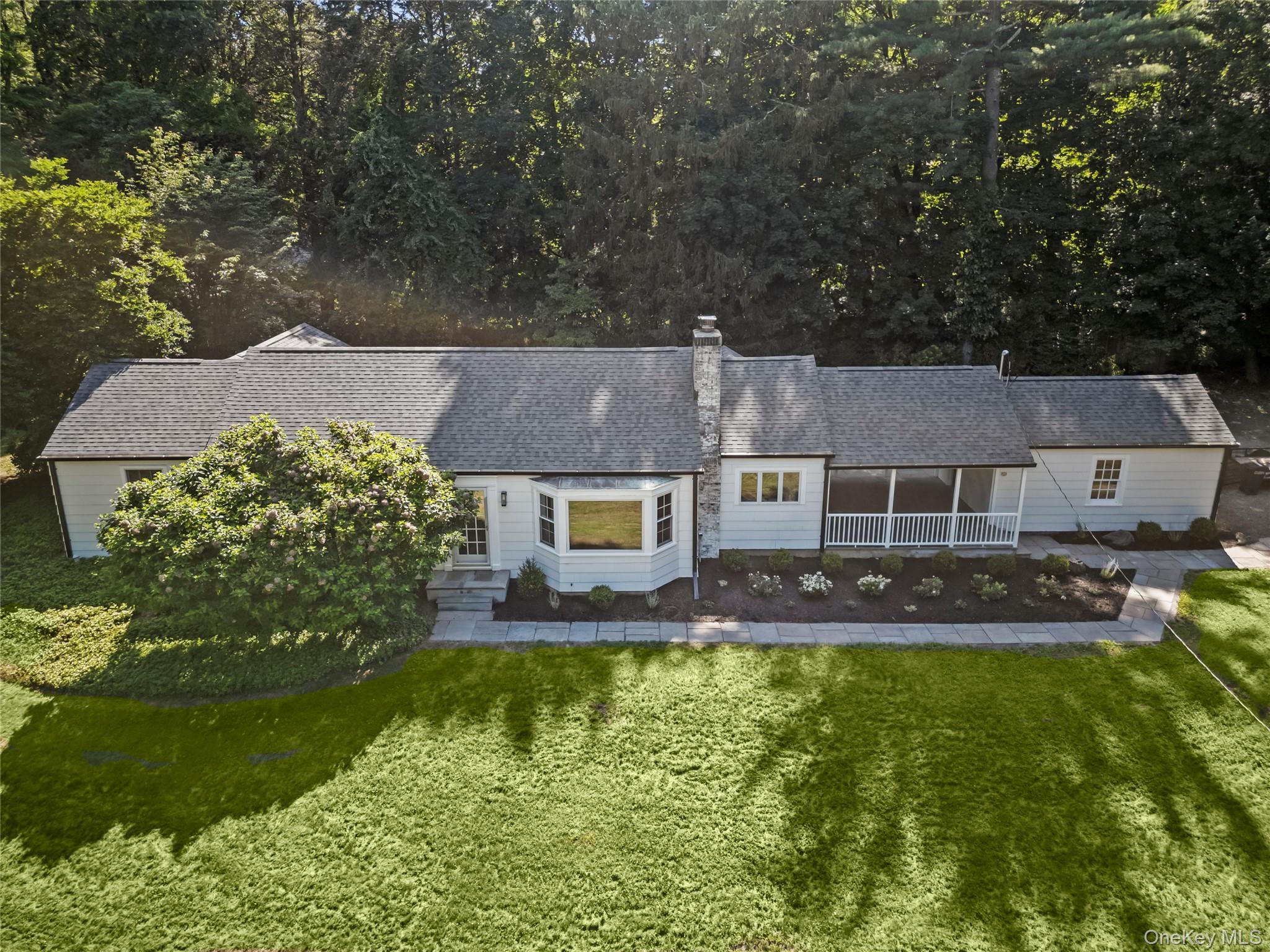 Move right into this beautifully updated three bedroom, two bathroom ranch, perfectly situated within the award-winning Chappaqua school district. Thoughtfully renovated from top to bottom, this home offers modern comfort and timeless charm. The heart of the home is the stylish kitchen featuring classic oak cabinetry, sleek quartz countertops, and ample space for cooking and entertaining. Both bathrooms have been fully renovated with fresh, contemporary finishes. Enjoy cozy evenings by the fireplace in the spacious living room, and retreat to one of the generously sized bedrooms for quiet relaxation. Step outside to a flat, private yard—ideal for play, gardening, or hosting gatherings on the patio. This turn-key home offers the perfect blend of convenience, comfort, and location. Don’t miss this exceptional opportunity to live in a move-in ready home with top-tier schools and suburban tranquility.