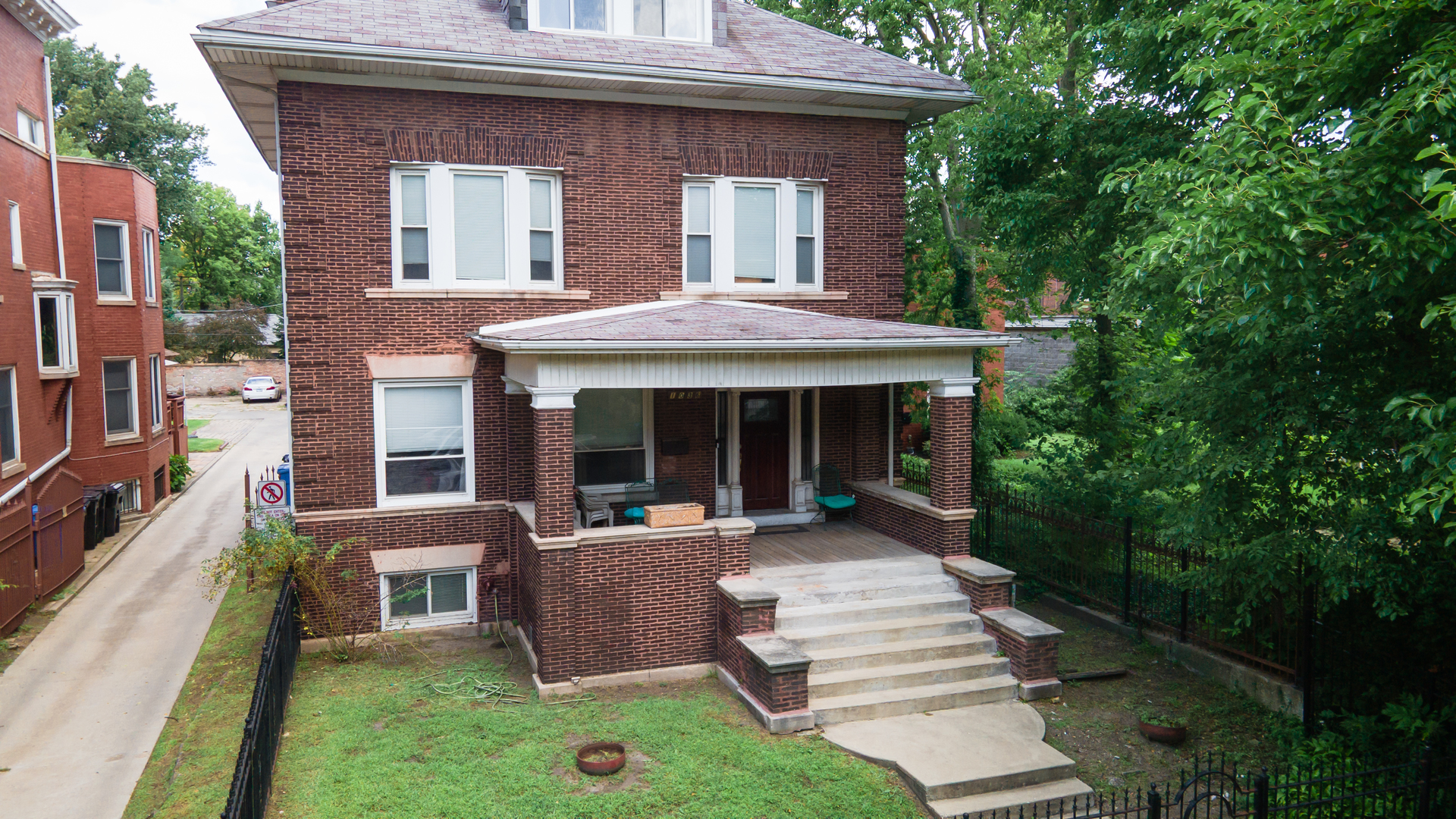 Spacious is the word that comes to mind as you view this solid brick residence in the well sought after Hyde park area. This property has a connection to the 44th president Barack Obama as the family grew up with them & shared a backyard.  The 2 1/2 garage was leased to the secret service detail assigned to protect the Obama's. The former garage, now two story coach house, was rehabbed to suit their needs and can be used as separate dwelling with its own HVAC, bath & kitchen or perhaps rented out for income or simply used as a guest house.  As you enter into the residence you will notice the 10 ft beamed ceilings, dark woodwork, stained glass and hardwood floors throughout. This property features two fireplaces, two jacuzzi tubs, two stairways and a 2nd floor rear balcony.  The 1st floor features a huge kitchen/dining room combo, pocket doors, kitchen nook, bathroom, & spare room.  Front of basement is finished and boast a family room, game room, two bedrooms etc. Rear has mechanicals with newer furnace & hot water heaters, laundry room and walkout to yard. Second floor has master bedroom & 3 additional bedrooms. Third floor has 1 bedroom & two rooms that share a large hall closet. Did I mention the shed and long driveway?  Showings for qualified buyers will be by appointment only. Come & see this Jewel and make it your own or invest and resale at a profit.  "AS IS"