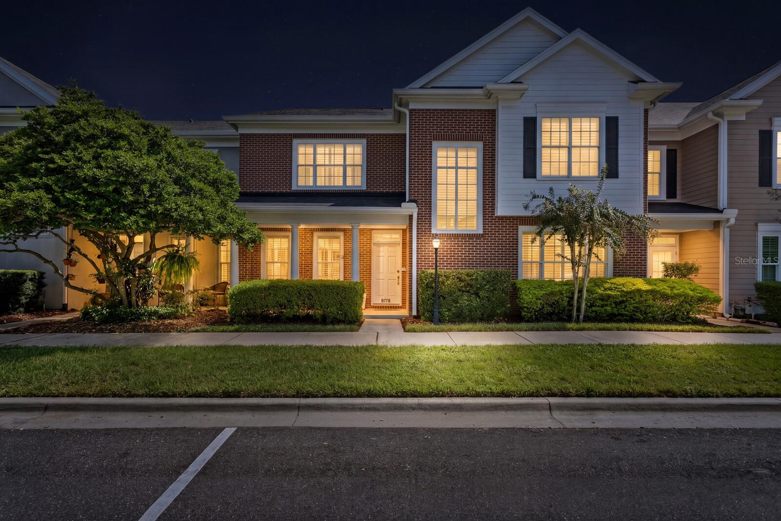 A Harbour Island townhome with the style and feel of a single-family home and the convenience of exterior maintenance and community services handled. Built by Bayfair, this home is set within a guard-gated community, where its classic brick facade, traditional architecture, welcoming covered entry, and crisp white trim create timeless curb appeal.An inviting entry foyer opens to interiors filled with natural light from expansive windows, complemented by plantation shutters. Beautiful built-ins add character to the living room, while separate living and dining rooms offer space to gather and entertain. The kitchen opens to the family room, creating a comfortable setting for everyday living, and features natural gas cooking, a Bosch appliance suite, marble countertops, updated cabinetry. Beautifully refinished oak hardwood floors downstairs and an updated half bath further enhance the home.The primary bathroom features a soaking tub, separate shower, and double vanities, while a Jack-and-Jill bathroom connects the second and third bedrooms. A dedicated laundry room adds everyday convenience. Outside, a raised paver patio with privacy fencing extends the living space, while a two-car attached garage and abundant guest parking make hosting and daily living easy.The home has two HVAC systems, including a downstairs Carrier system installed in May 2023 that is still under warranty, with coverage transferable to the buyer.Community amenities include a community pool, neighborhood park and greenbelt for walking or jogging, plus a marina with boat slips available for separate purchase when offered for sale. Life Time Harbour Island is within walking distance. Just minutes from Benchmark International Arena, Sparkman Wharf, Water Street, the Riverwalk, museums, dining, and the arts, this Harbour Island townhome brings together residential calm, walkable urban access, and island living in the heart of the city.