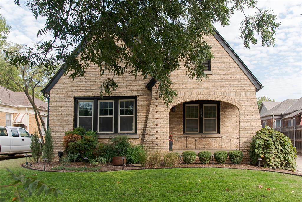 Charming 1930 brick bungalow nestled in the heart of historic Miller offers timeless character with a thoughtful blend of modern updates. The Tudor-inspired fa&#231;ade, accented by classic trim and an inviting front porch, sets the tone for this light-filled home. Inside, warm hardwood floors and soft natural light create a sense of ease throughout the open living and dining areas. A decorative fireplace anchors the living room while generous window groupings highlight the craftsmanship of the era.
The kitchen combines style and function with slate flooring, solid-surface counters, stainless steel appliances, and abundant cabinetry. Two bedrooms share access to an updated full bath finished in sleek modern tile with a mosaic accent, custom vanity, and ample built-in storage. Each bedroom offers rich hardwood floors, updated lighting, and multiple windows that enhance the home’s airy feel. A private backyard retreat with native landscaping, stone walkways, and a sculptural fire pit create a serene setting for gatherings or quiet evenings. A detached garage and long driveway provide off-street parking and additional storage. Located minutes from the Plaza District, Uptown 23rd, and downtown Oklahoma City, this home offers walkable access to parks, restaurants, and neighborhood favorites while preserving the historic charm that makes Miller so beloved. Move-in ready and beautifully maintained, this bungalow captures the perfect balance of classic architecture and contemporary comfort.