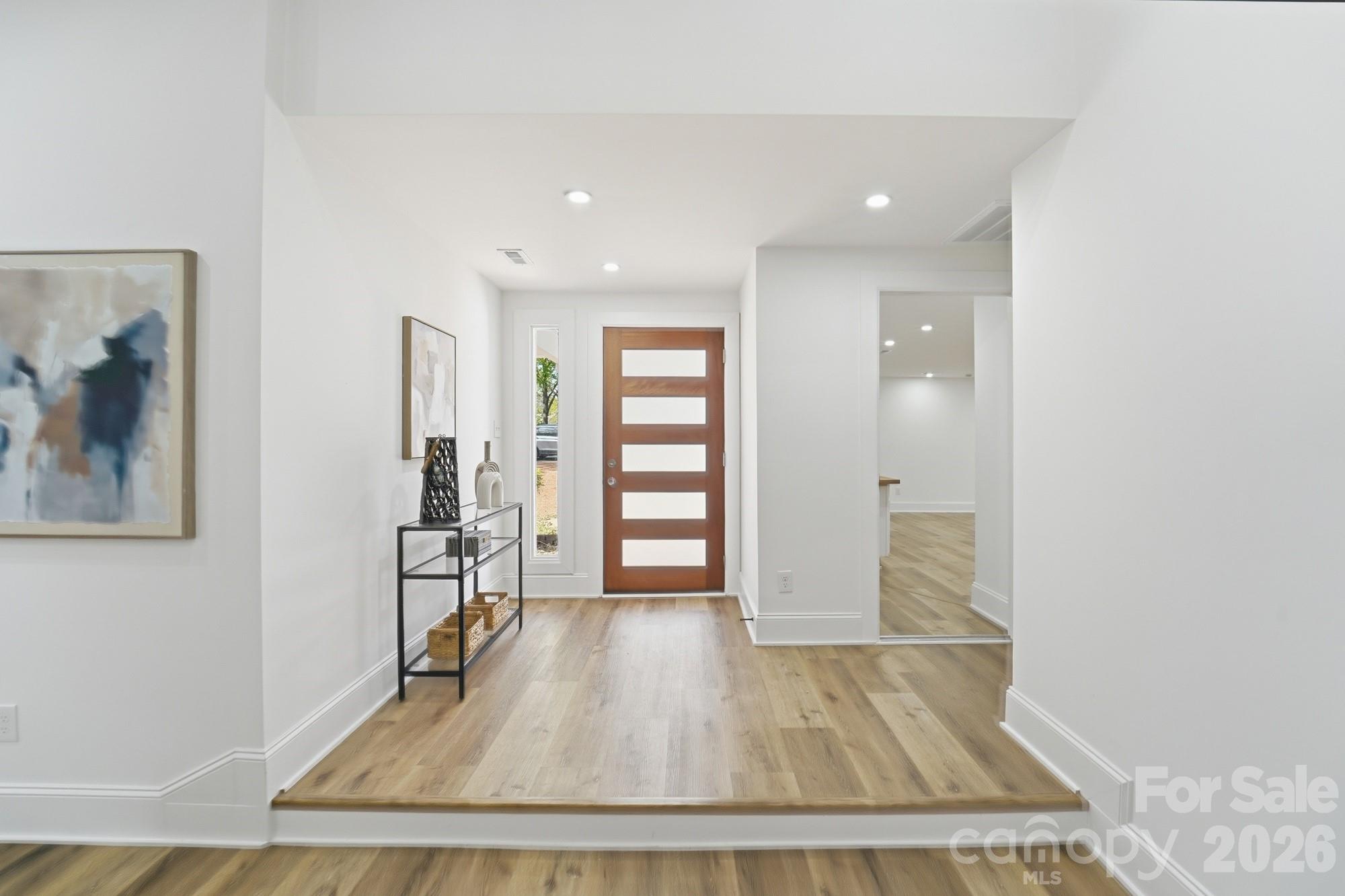 Welcome to this beautifully updated, move-in-ready home that perfectly blends modern style, versatility, and exceptional value.  Priced $50,000under appraised value, this property offers instant equity from day one-this is an outstanding opportunity for homeowners and investors alike .  The main residence features 4  spacious bedrooms and 3 fulls bathrooms, providing ample room for family living, entertaining, or hosting gatherings. The converted garage is ideal as an in-law-suite, guests or private rental opportunity.  Complete with its own separate entrance, this flexible space adds privacy and income potential, making this home truly one of a kind. Schedule your showing today!