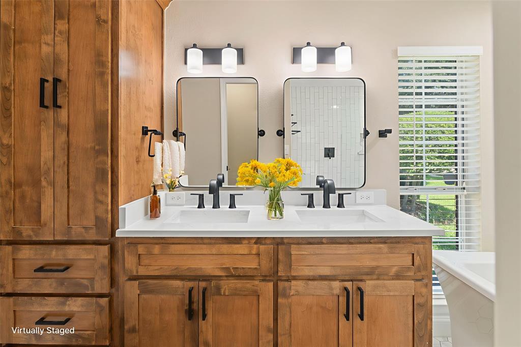 **Where Every Day Feels Like a Weekend Getaway**Step inside this move-in ready home, perfectly situated in a well-established neighborhood just 10 minutes from DFW Airport, Lake Lewisville, and Vista Ridge Mall. The crown jewel of the home is the fully renovated primary bathroom, featuring over $40,000 in upgrades, including custom cabinetry, a freestanding soaking tub, oversized frameless walk-in shower with designer tile, quartz countertops, modern light fixtures, upgraded water fixtures, and new mirrors—every detail thoughtfully designed to create a spa-like retreat. The home has been freshly painted throughout (2025), creating a bright and inviting atmosphere. You’ll love the luxury wood laminate flooring that flows seamlessly throughout. Major updates include a new roof (2025) and HVAC system (2019), offering long-term comfort and peace of mind. Step outside to your private backyard oasis, complete with a sparkling saltwater pool, ideal for relaxing. This home strikes the perfect balance of luxury, comfort, and everyday functionality—highlighted by a primary suite you’ll never want to leave!