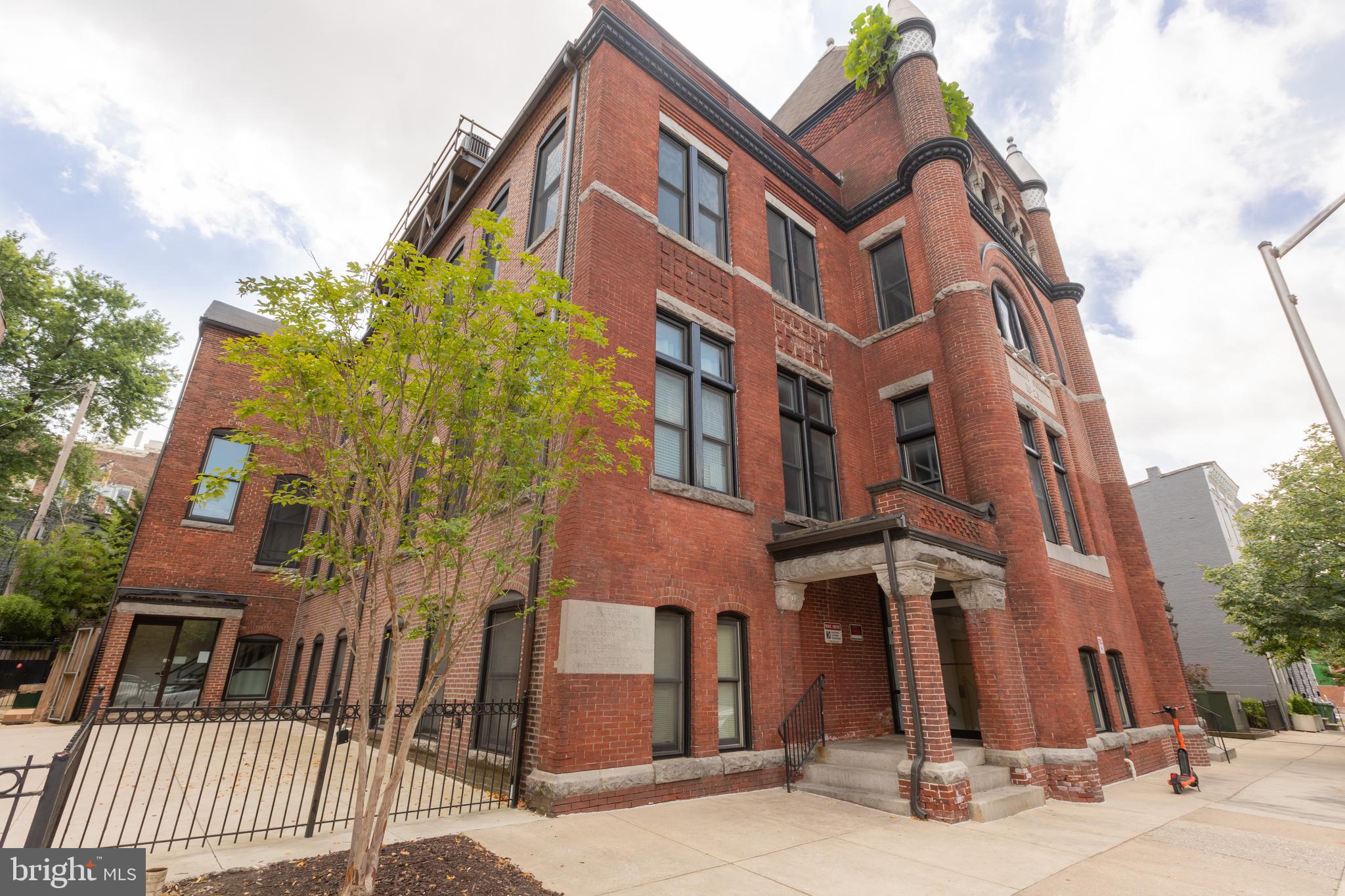 Live in the Heart of Fells Point in a Historic Schoolhouse ConversionJust blocks from the vibrant waterfront, Fells Point, and the Inner Harbor, this top-floor 1-bedroom, 1-bath condo offers unbeatable walkability to beloved restaurants like Ekiben, cozy cafés, and local shops. Enjoy the best of Baltimore living in a charming, light-filled home with modern comforts and rich historic character.Set in a beautifully restored Victorian building—formerly Public School 25 and converted in 2006—this unit features original wide-plank pine floors, soaring ceilings, and oversized windows that bathe the space in natural light. The open living area includes recessed lighting, a ceiling fan, central A/C (roof unit), and electric heat. The well-appointed kitchen is complete with an electric range, dishwasher, microwave, and washer/dryer for convenience. Shared patios on either side of the building offer perfect spots for morning coffee or evening relaxation.Don’t miss your chance to own a unique piece of Baltimore history in one of the city’s most exciting neighborhoods.