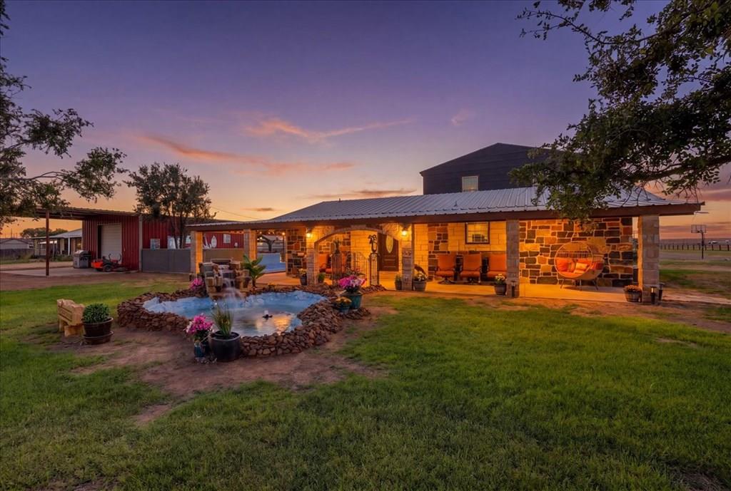 The paint isn't even the wildest part of this property. This one truly has it ALL. Featuring 7 bedrooms, an unattached in-law suite, shop, resort-style pool, roping arena, sports court, outdoor kitchen, and the list just keeps going. Every corner reveals another incredible surprise, making this a property that's impossible to appreciate from photos alone. Bring a checklist... you'll lose count trying to keep up with everything this property offers.