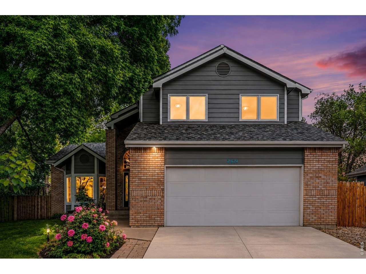 Exceptional space & outstanding value in desirable English Ranch! Backing to a large greenbelt with no homes directly behind, this beautifully maintained home offers mature landscaping & wonderful backyard privacy. With over 3,600 square feet, 5 bedrooms & 4 baths, there's an impressive amount of home at this price-and with no HOA or Metro Tax, buyers can enjoy lower ongoing costs as well. Conveniently located near parks, trails, Front Range Village shopping & dining, with easy access to I-25. Additional financing incentives may be available through the seller's preferred lender, including discounted closing costs for qualified buyers-ask for details. Inside, soaring vaulted ceilings, hardwood floors, fresh interior paint, updated lighting, newer carpet & beautifully refreshed bathrooms create a bright & welcoming feel. The spacious kitchen features a breakfast nook overlooking the backyard & opens to a comfortable family room with gas fireplace. A formal dining room, main-floor bedroom that also works beautifully as a home office & large laundry room with utility sink add flexibility & convenience. Upstairs, the expansive primary suite features an updated five-piece bath & walk-in closet, while two additional bedrooms share a full bath with double vanity. The fully finished basement adds even more usable living space with a large rec room, wet bar, additional bedroom & 3/4 bath-ideal for guests, teens, entertaining or multi-generational living. Outside, enjoy the large greenbelt setting, mature landscaping, updated sprinkler system, oversized refinished patio & privacy fence. First American Home Warranty included. If you've been searching for space, privacy, updates & value without the added expense of an HOA or Metro District, 2824 Antelope Rd deserves a look.