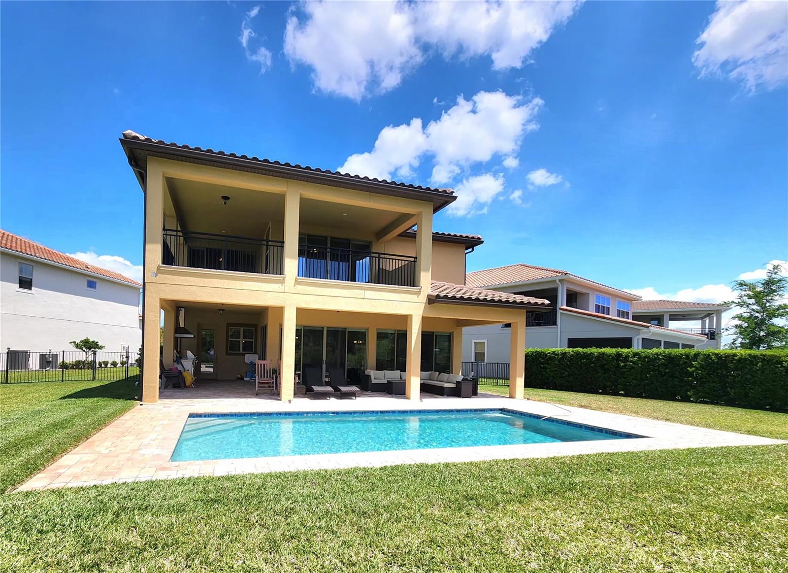 Golf Front Luxury Home with Water & Conservation Area Views on an Oversized Lot – Lake Nona Area. Discover one of the most unique homes in Eagle Creek, offering the best value for Pool, Golf+ Water + conservation views in the community. Perfectly positioned on an oversized lot, this residence delivers a rare combination of privacy, scenery, and resort-style living in the heart of the Lake Nona area.The home features a stunning resort-style backyard with a heated pool, spacious deck, and a fully equipped summer kitchen, creating the ideal setting for entertaining or relaxing while overlooking the golf course, tranquil water, and protected conservation areas.Inside, the open and elegant layout includes high ceilings, premium finishes, and expansive windows that frame the outdoor views. The second-floor wrap-around balcony offers panoramic vistas of the fairway and natural landscape—an unmatched daily experience. With 4 bedrooms, 4.5 bathrooms, a gourmet kitchen, generous living spaces, and a 3-car garage, this property blends luxury, comfort, and functionality. Other highlights include retractable blinds on all three sliding doors in the house, and a fully fenced yard with privacy hedge. Key Features:Golf Front residence with premium Water & Conservation Area ViewsOversized Lot offering privacy and expanded outdoor livingResort-Style Backyard with heated pool and summer kitchenExpansive wrap-around balcony with panoramic viewsLuxury finishes, high ceilings, and abundant natural lightLocated in the desirable Lake Nona area.Best value golf + water + conservation views in Eagle CreekLocated in the gated, amenity-rich community of Eagle Creek, residents enjoy top-tier security, a championship golf course, clubhouse, fitness center, pools, and proximity to Medical City, top-rated schools, and Orlando International Airport. This community is surrounded by Lake Nona’s top-rated schools, situated within the A-rated Orange County Public Schools district. Among the most renowned are Eagle Creek Elementary, Lake Nona Middle School, and Lake Nona High School—A+ institutions with excellent track records that offer a safe, modern environment focused on academic success. Also, inside of community features !LINGO, a multilingual preschool and daycare.This is a rare opportunity to own a home that truly captures the essence of Florida luxury living.NO CDD- SCHEDULE YOUR PRIVATE TOUR TODAY! - Enjoy a seamless transition! Seller is looking for a flexible closing date or a short-term leaseback option to facilitate their relocation. Perfect for buyers who need a little extra time to plan their move.