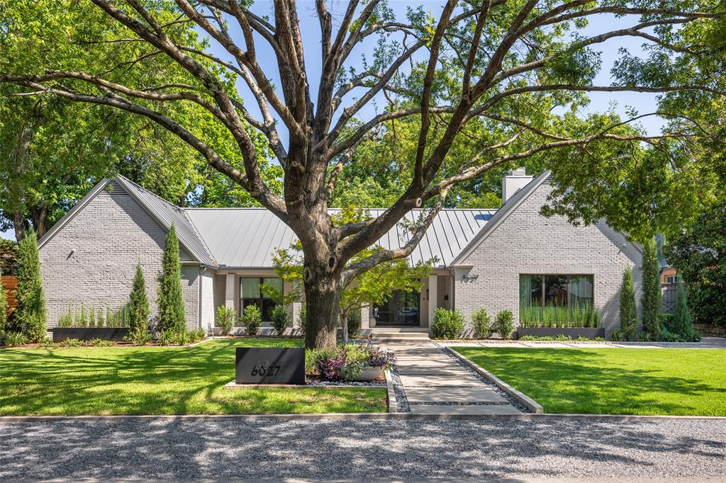 Nestled on one of the most charming and tree-lined streets in Preston Hollow, 6027 Mimosa Lane is a true designer’s dream. This beautifully updated, move-in-ready home offers four bedrooms (including a stunning primary suite on the first floor), 6.5 baths, two spacious living areas, and an upstairs game room—perfect for both relaxing and entertaining. The custom Ornare kitchen is a chef’s delight, featuring sleek built-in Miele appliances, sophisticated finishes, and abundant storage throughout. Step outside to your private backyard oasis, where mature trees create a serene setting around the pool and hot tub. A built-in outdoor kitchen and covered patio make this home ideal for gatherings year-round. With its thoughtful design, high-end details, and inviting spaces inside and out, this Preston Hollow gem effortlessly blends style, comfort, and livability.