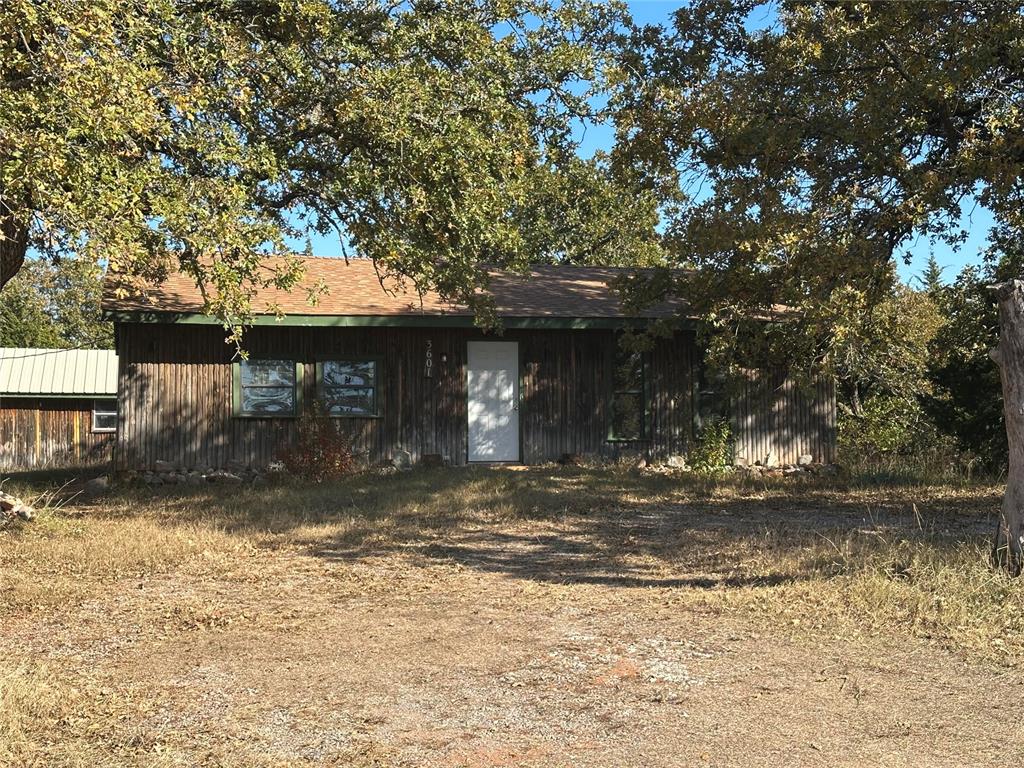If the simple life is what you desire, this is the property for you!  This cabin style home is a two-bedroom, one bath that sits on (2.5) MOL acres on the corner of Cedar Lane and Charles David Drive.  There is an additional (1) acre full use easement on back of property that the current owner purchased from the neighbor to the East.  New roof approx. one and a half years ago.  Has a new water heater and new water well pressure tank.  Garage/shop has a metal roof.  Home has an "in the wall" heat and air unit in living room and is very economical.  Buyer or buyer's agent to verify all information.
