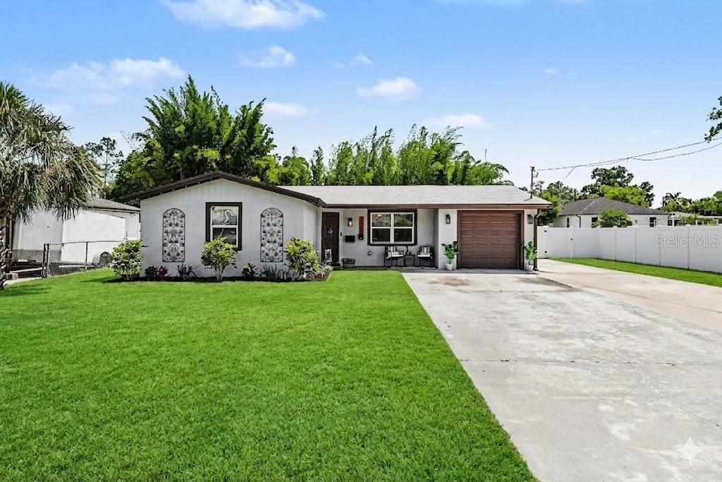 This exceptional 3-bedroom, 2-bath residence showcases refined design and elevated living at every turn. Thoughtfully upgraded throughout, the home features a NEWER ROOF, AC, and WATER HEATER, offering both quality and peace of mind. The interiors are enhanced with sophisticated, modern finishes and a cohesive aesthetic that creates a true sense of luxury.Designed for both everyday comfort and effortless entertaining, the home offers a seamless, well-appointed layout with an elegant flow between living spaces. Outdoors, a heated saltwater pool is complemented by a screened-in patio and a covered outdoor dining area, creating a private, resort-style setting perfect for year-round enjoyment. The expansive yard offers ample space to relax or play, all set on an exceptional street that enhances the home’s overall appeal.With its distinctive character, upscale finishes, and attention to detail, this residence presents a rare opportunity to own a truly unique and beautifully curated home.