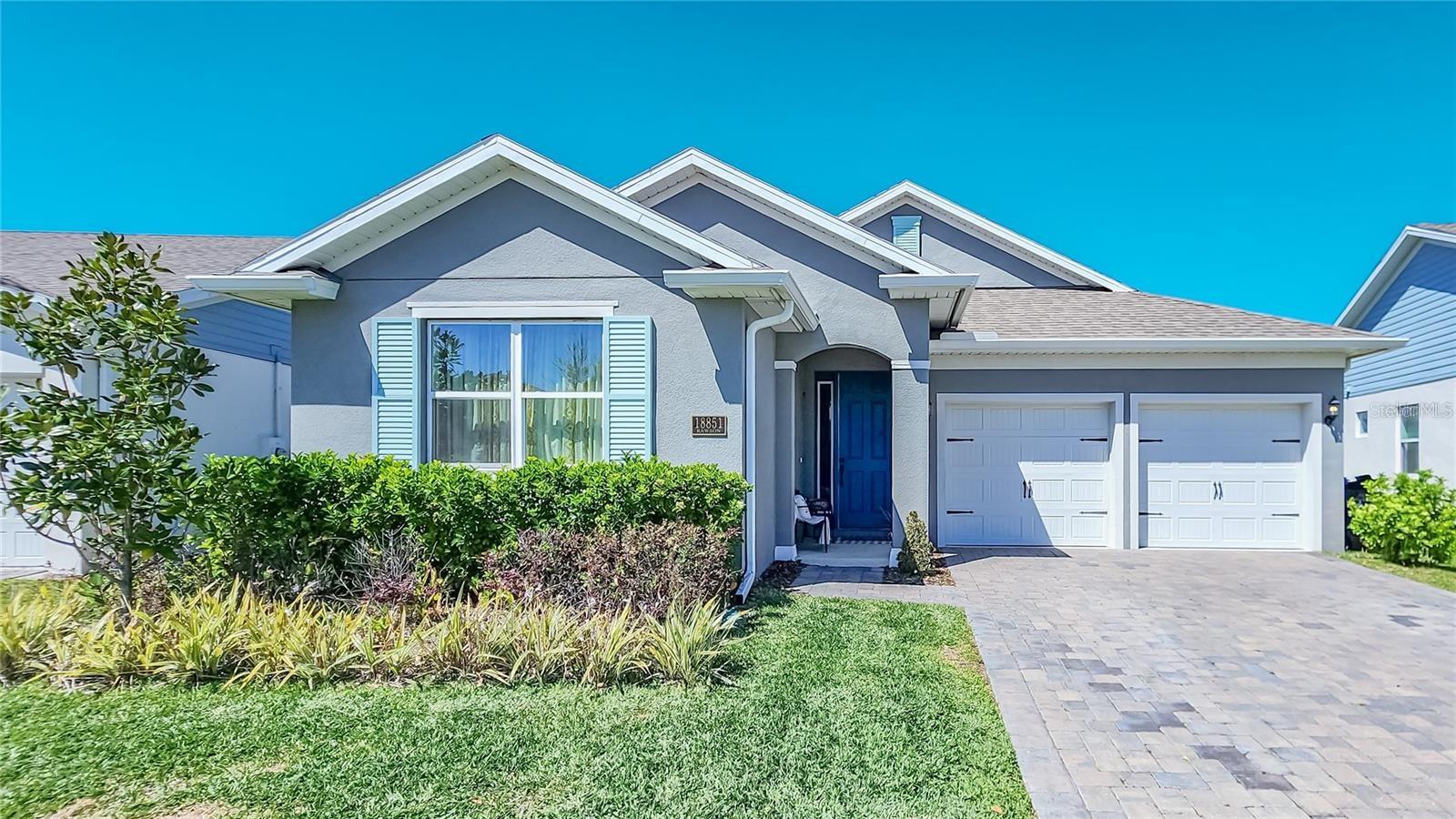 Welcome to your dream home in the heart of Lake Nona! This stunning 4-bedroom, 3-bath residence at 18851 Rawson Street offers the perfect blend of modern luxury, smart design, and exceptional location. Built in 2022, this home features approximately 2,240 sq ft of open living space and more than $65,000 in upgrades, delivering a turnkey experience for the most discerning buyer. Step inside to discover an elegant open floor plan connecting the great room, dining area, and gourmet kitchen—perfect for entertaining or everyday living. The kitchen boasts premium cabinetry, sleek quartz countertops, stainless steel appliances, and an oversized island with seating. The primary suite is a true retreat with dual walk-in closets and a luxurious ensuite bathroom showcasing a 24×48” designer tile shower, double vanities, and contemporary finishes. A spacious laundry room with custom 42" shaker cabinets adds both function and style. Enjoy Florida living at its best with a charming front porch, a beautifully paved driveway, and a private backyard ideal for outdoor relaxation or gatherings. Located in the sought-after Summerdale at Lake Nona community, this home offers access to top-rated schools, major highways (417 & 528), medical facilities, and Orlando’s premier shopping and dining destinations. Community amenities include a lakeside pool, playgrounds, and green spaces designed for active family living. Whether you’re searching for your forever home or a high-quality investment, 18851 Rawson St combines comfort, design, and location like no other.