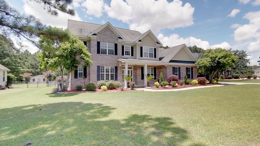 Welcome to 107 Andee Way - Where comfort meets elegance!  This beautifully designed 5-bedroom, 3.5-bathroom home is located in the desirable Sweetbriar Lakes subdivision.  Step inside to a light and airy interior, where the welcoming entrance foyer opens to spacious living areas perfect for everyday living and entertaining.  The heart of the home features a well-appointed kitchen with granite countertops, brand-new stainless-steel appliances to be installed by July 8, and plenty of cabinet space. Enjoy the ease of the main level primary suite, offering privacy and comfort featuring a fireplace, large bath and generous closet space. An office space on the main floor provides the ideal spot for working from home or managing daily tasks.  You will also find a versatile bonus room - perfect for a playroom or fitness area. Upstairs you will find 4 generously sized bedrooms that are flexible for guest rooms or additional office space.  With thoughtful details throughout and a serene neighborhood setting, 107 Andee Way offers the perfect blend of style and functionality.  Don't miss the opportunity to call this beautiful property home - schedule a tour today!