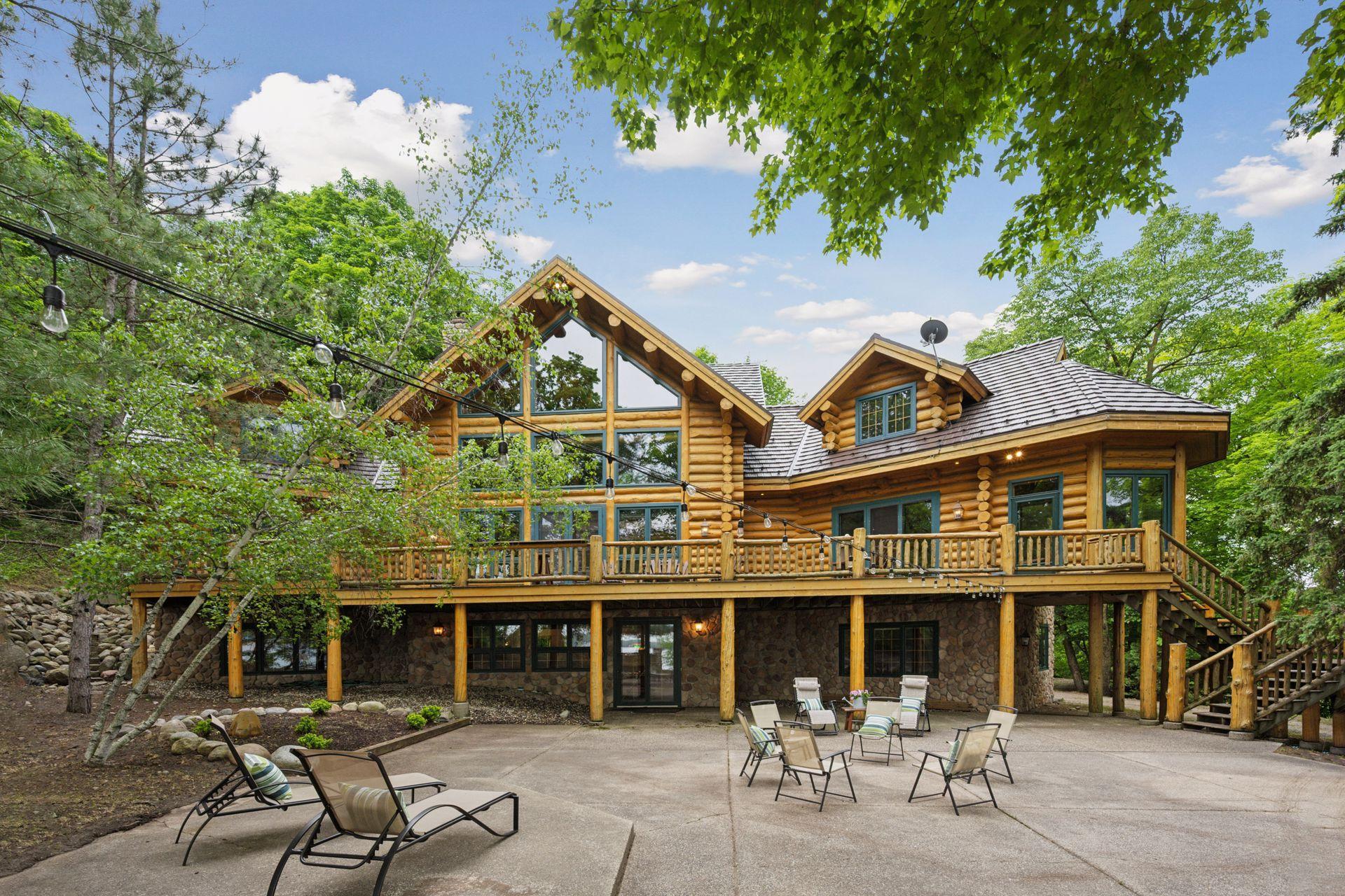 Welcome to your private oasis on the pristine shores of Lake Sylvia. East Lake Sylvia is known for great fishing, gorgeous sunsets, water sports & taking long pontoon cruises. This one of a kind custom log home is the perfect blend of modern living and rustic feel. Enjoy exquisite views, peaceful nature sounds and privacy of the heavily wooded property. Inside you'll find large entertaining spaces & oversized bedrooms to house many generations. The updated modern kitchen with high quality granite countertops, stainless steel appliances & large center island is the perfect setting for socializing with your favorite food & beverages. The large game room is already set for billiards & table top shuffleboard. The property also includes a once used sugar shack for maple syrup production and of course all the beauty of 10 private acres. All furnishings, furniture & homewares are included. Plus a 48ft dock, custom built boat house with pontoon & cable system to pull the boat in. Top quality roof has been replaced less than 5 years ago. Adjacent lot to the west could be purchased for the ultimate privacy & peacefulness.
