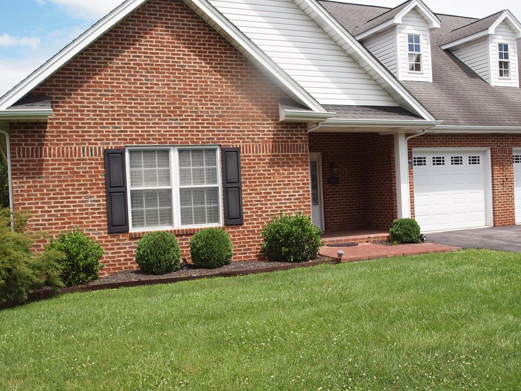 Wonderful 2 bedroom townhome on level lot.  No steps. Hardwood and tile floors.  Vaulted ceilings.  Gas fireplace.  One car attached garage.  All kitchen appliances convey.  New roof to be installed in the next few weeks.  Beautifully landscaped yard.  Master bathroom has both a walk-in shower and a separate jetted tub.  All information is provided as a curtesy and is not guaranteed.  Buyer or buyer's agent to verify all information.