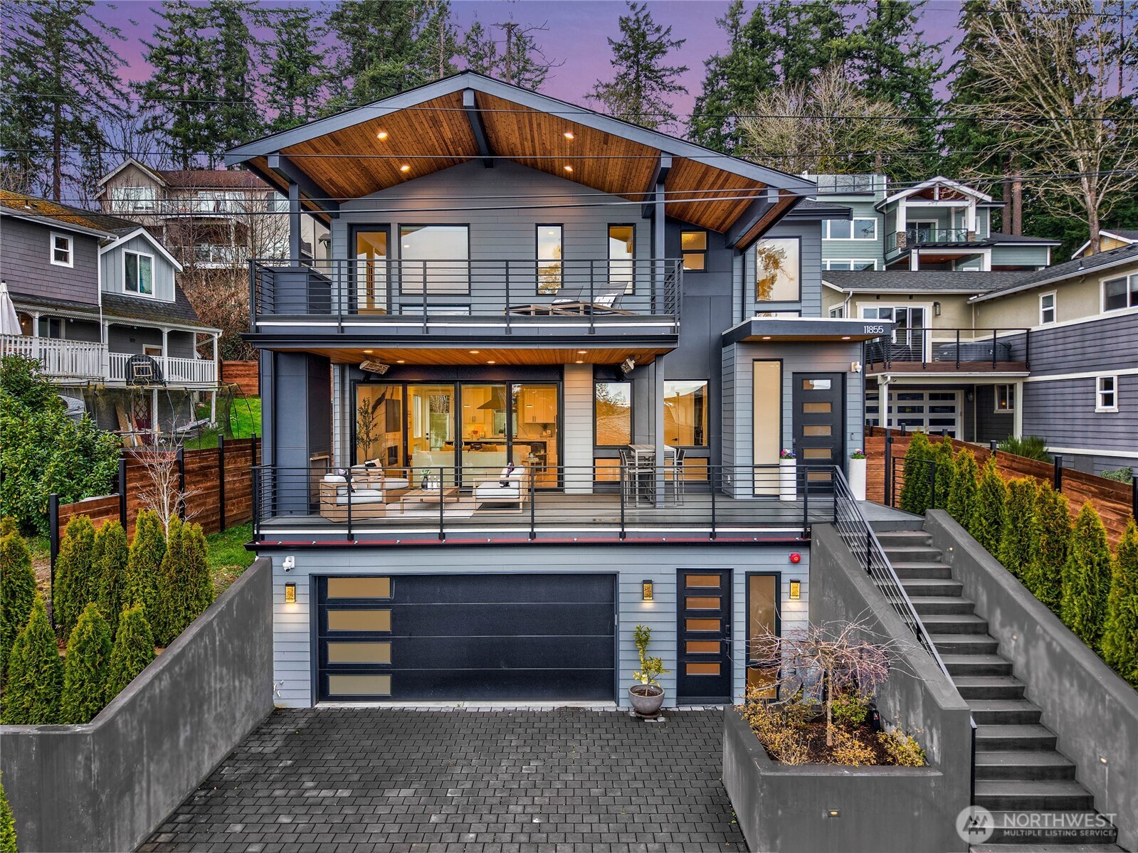 Perched above the skyline where life feels quieter in Kirkland’s most private, adventurous & social enclaves, you will discover an amenity-rich, transitional-modern glass showpiece built to capture strategic vista views to full Mt.Rainier, Bellevue & Lake WA! Welcome to Goat Hill, where tranquility begins & Summer days end at the deeded waterfrt beach! Lifestyle-conscious design meets seamless indoor/outdoor entertaining venues: Gym, 6-person Finleo sauna, office w/separate entry, media room w/wet bar, open bonus room; Heated outdoor living rm begs for al-fresco socials & fenced backyard for pups/play alongside the deck (gas BBQ line). Gorgeous two-toned kitchen, fabulous pantry, Wolf 6-burner (+griddle) range & oven, Subzero, Bellmont cabinetry, substantial waterfalled island. Boutique Hotel-inspired Owner Suite has water views, lounge deck, luxury spa bath & walk-in closet. Distinctive detailing: full slab quartz fireplace, artisan iron staircase, Lutron automated blinds, generator, A/C, cedar T&G soffits. Venture to everything Eastside: 10 min to DT Kirkland’s boutique sips/eats/park concerts/markets/galleries & Totem Lake Mall with Whole Foods/Trader Joes; Wtrft Juanita Pk w/farmer’s market/playground, Spuds, Oto, Café Juanita, wine bar at your doorstep; Mins to 600 acres of dog-friendly State Parks w/hiking trails adorned w/old growth trees, salmon streams, nature; 20 mins to vibrant DT Woodinville wine country. This is an exceptional mix of luxury, location & lifestyle!