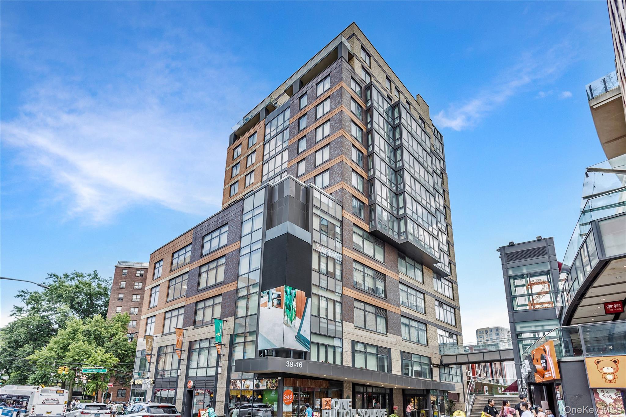 Don't miss your opportunity to own this truly one-of-a-kind property in the heart of fast growing downtown Flushing. Situated on the PH level of the famed One Fulton Square luxury condo building one block away from the 7 train, this spacious 3br, 3 full ba unit is only one of only two units on the top floor. This unique unit boasts a private rooftop terrace with panoramic views of the city, the bay, bridges, and downtown Flushing, including direct view of the bustling Main St and Roosevelt Ave intersection. Imagine watching the Lunar New Year's parade or enjoy the July 4th fireworks show right from your own private sanctuary! Entertain in your huge living room with Manhattan views, all connected to the gourmet chef's open kitchen with all top of the line Miele appliances, wine frig, and large island with bar top. The huge master bedroom has its own private balcony, walk-in closet, large master bath with jetted tub, separate shower, and double sinks. 2 other good size bedrooms and 2 additional full baths. Laundry room with washer and dryer plus lots of additional storages throughout the unit. Entire unit has been wired with embedded speakers so you can listen to your favorite music whichever room you are in. 24 hours doorman and concierge. Tons of dinning and entertainment options right downstairs, steps away from Tangram and Skyview mall, 1 min walk to 7 train.