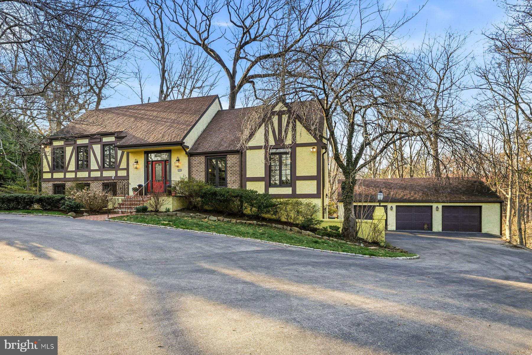 Welcome to this fabulous North-side Haverford residence, located in highly sought after, walkable, Main Line Merion Cricket neighborhood. Beautifully set on a private lot in a  quiet cul-de sac, it offers an open interior floor plan, seamlessly integrating exterior living spaces with easy access to the oversized 3 1/2 -car garage. Features include an inviting two story entrance foyer opening up to multiple rooms including the spacious living room with bright windows and oak floors, dining room with oak floors and views of the backyard, renovated white kitchen with custom cabinetry, SubZero refrigerator, Viking double range, bright breakfast room with wall of windows, family room with cozy brick fireplace, custom built-ins and access to the expansive deck and lovely grounds, partial staircase leading  to an open loft before entering the inviting primary suite with en-suite bathroom, two additional generously sized bedrooms, each with their own updated bathroom and an expansive walk-out lower level with additional full bathroom, in-law suite option, exercise room, potential 4th bedroom and enormous bonus room perfect for media, game room and flexible recreation use. Enjoy the wonderful options for both interior and exterior use while being in walkable proximity to trains, restaurants, shopping renowned schools and more!