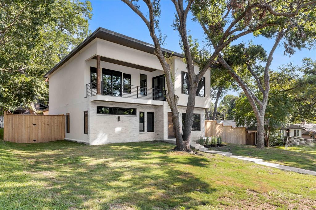 Perched on one of the most picturesque tree-lined streets in Eastwood Estates, this home combines the convenience and efficiency of new construction with the charm and character of a well-established East Dallas neighborhood. The open floor plan is ideal for entertaining, with expansive windows that blur the lines between indoors and out. The spacious primary suite includes a private balcony, while the spa-like bathroom provides a true retreat for even the most discerning buyer. Outside, the generous backyard offers ample space for a pool while still leaving plenty of green space for kids or pets. This rare blend of modern amenities and neighborhood charm is a hard find in today’s market—don’t miss it!