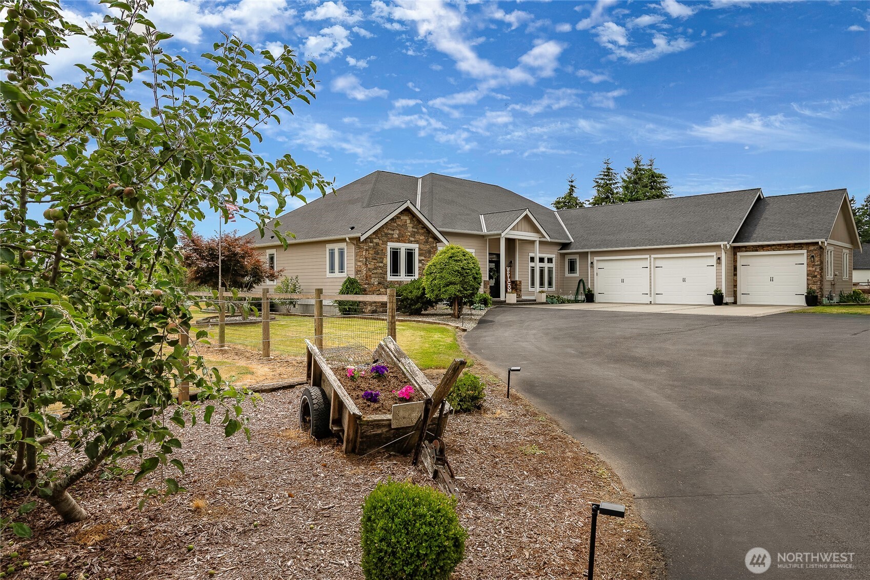 Welcome to your own 6.95-acre country estate with so much to offer! It's the perfect home with amazing views, peaceful, private and room to roam. Located just outside of Lynden tucked away at the end of a private lane in the sought-after Lynden School District. This newly updated 4323 square foot one-level home features an amazing kitchen with big windows overlooking the backyard, new white cabinets, quartz counters, high-end appliances, huge island with 6-person seating and large walk-in pantry. The great room is vaulted, light and bright and features a gas fireplace! Home has 4 bedrooms all with walk-in closets, an office, 2 living rooms with gas fireplaces, a formal dining room, sitting room with a bar area and a cool drop-zone area complete with a water fountain. The primary suite is spacious with 2 walk-in closets and a spa-inspired bath with a tiled shower and soaking tub plus beautiful views overlooking the property. The back of the home opens out to a large patio with fire-pit for entertaining! Partially fenced 6.95 acres includes a 4-stall horse barn w/half bath & washer, storage shed with lean-to (great for RV storage) a garden shed and fenced garden featuring apple, cherry, peach and plum trees, blueberries, strawberries and more! Huge 3-car garage with Gentran hookup and water purification system.  New furnace & A/C in 2023, new roof and exterior paint in 2024. Don't wait, this is truly an opportunity to own a special place in one of Lynden's most desirable areas.