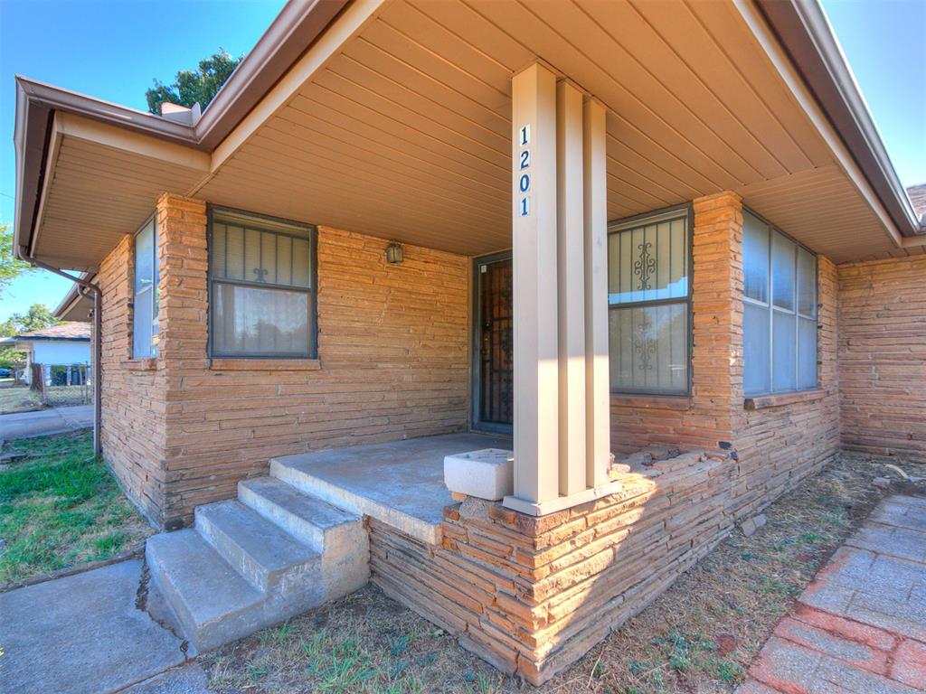 WOW.  Soooo much potential.  This house sits on a corner lot and with easy access to almost everywhere, you will love the location.  Living room with lots of room to roam.  Some updates have been done.  With a little elbow grease, you could own a fabulous piece of the city.  Nice wood floors under the carpet.  Large 2 car garage.  House being sold "AS-IS, WHERE IS"!! Call today for your private viewing.