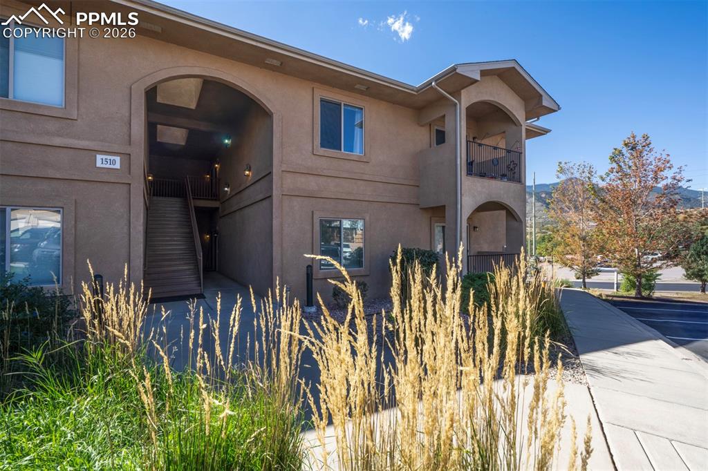 Beautiful Condo with Stunning Mountain ViewsWelcome to this spacious 3-bedroom, 2-bath ranch-style condo offering 1,328 sq. ft. of comfortable living. The open kitchen, dining, and living areas are filled with natural light and feature granite countertops, stainless steel appliances, breakfast bar, recessed lighting, and rich dark wood cabinetry. Cozy up by the corner gas log fireplace or step out onto the private balcony to relax and enjoy the peaceful views. The primary suite boasts a granite double vanity, walk-in shower with built-in seat, and an oversized walk-in closet. Two additional bedrooms share a beautifully updated bath with a tiled tub/shower surround. Brand new linoleum in the bathrooms and brand new carpeting just installed! A full laundry room with shelving and included washer/dryer adds convenience. Every window frames a picturesque mountain view!This home comes with a detached 1-car garage plus plenty of extra parking. Villas at Bear Creek common areas are extremely well maintained. Ideally located across from Bear Creek Dog Park and Bear Creek Regional Park, and minutes from Red Rock Canyon, I-25, and Hwy 24—this is Colorado living at its best!