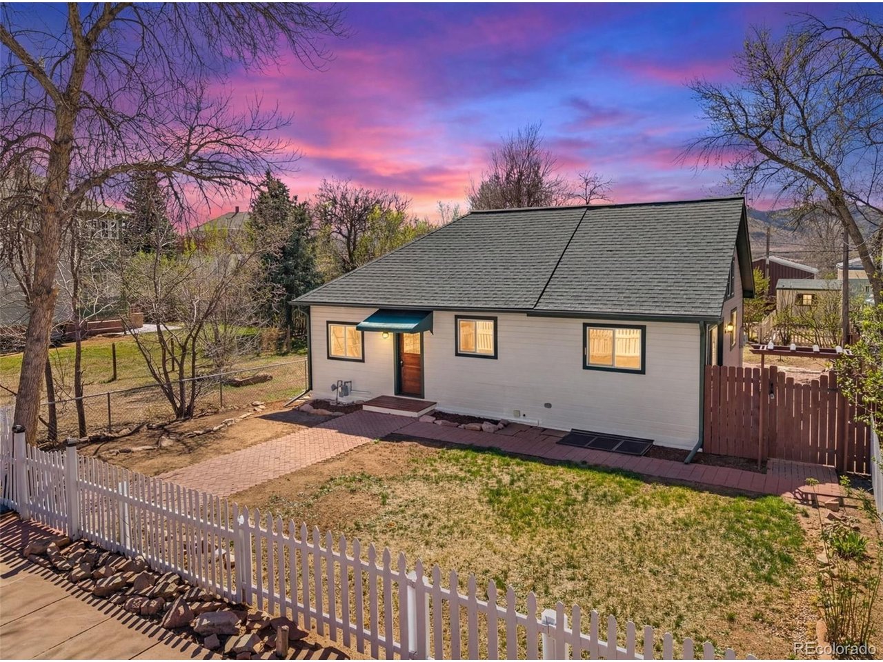 Walk to everything with foothill views! This 3 bedroom 1 bat home is totally updated and move in ready. huge kitchen with 42" cabinets and wood floor. Primary BR has a 9'X7' cedar lined walk-in closet just off the remodeled full bath. Large dining room with pantry, cathedral ceilings and full of light. Steps down to the mostly finished basement starting with a family room/3rd bedroom, then on to an office and awesome laundry room with Washer and Dryer included! Plenty of space left in the basement for storage or more finish. Door to huge brick patio off the dining rm, then on to the large back yard w/10X8 Shed. City approved for an ADU with zero lot line variance!! The second entrance to the basement comes off the back of the home and acts as a walkout basement. With old town just steps away, and the foothills right there, you will find this to be the perfect home for you!! This home is ready to move into now and has plenty of options for later. You have to see this one!!