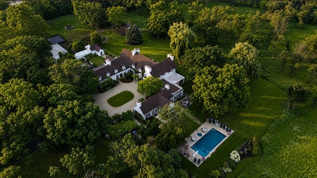 TAKES OUR BREATH AWAY! For agents representing discerning luxury buyers, Shagbark is the most extraordinary offering to come to the North Shore. Walter Frazier's celebrated 1938 architectural masterpiece, Shagbark, comes to market following a six-year, no-detail-overlooked re-mastery of the entire estate. Shagbark blends grand architecture and bygone craftsmanship with the efficiency and reliability of all new infrastructure and interiors. This isn't another beautiful Lake Forest Grand Dame who's seen better days, this is a breathtaking example of a renovation. Hidden in plain sight on 11 acres (3.5 acres of irrigated grounds buffered by 7.5 acres of tax incentivized native prairie), Shagbark encompasses 11,000 square feet of absolute perfection. The residence offers six bedrooms, eight full baths, and three half baths, including two primary suites, one on the main level. At the heart of the home is a bespoke Clive Christian kitchen featuring a fireplace, Baccarat chandeliers, a custom La Cornue Chateau Grand Palais 180 range, and Miele appliances. Every bed, bath and inch of space has been renovated and beautifully finished. Seven fireplaces (six have been renovated to dual fuel, gas or wood). Additional highlights include a 600-gallon saltwater aquarium, gift-wrap room, whole-property RO water system, resort-style pool, half basketball court, 28 zones of indoor and outdoor audio, and 18 wireless high speed access points. The interiors, designed by Joey Leicht Designs and JTM Creative, are extraordinary. Even more compelling, the estate is offered fully furnished with the curated collection of designer furniture from Ebanista, Holly Hunt, Dorya, Gracie, Baccarat, Ralph Lauren Home, Baker Furniture and other distinguished makers. The estate's major systems have been comprehensively modernized, including plumbing, electrical, and mechanical infrastructure. The renovated Ludowici clay tile roof will require little more than routine maintenance for decades to come. A former kennel has been transformed into a Canyon Ranch-inspired fitness center with spa bath/steam. A restored greenhouse connects to a sophisticated cigar lounge. Renowned landscape architect, John Mariani, reimagined the grounds with magnificent hardscapes, garden rooms, cutting gardens, and the addition of more than 200 mature trees, creating remarkable beauty and privacy. The approach itself is unforgettable. A half-mile driveway winds through mature woodlands before revealing the estate's gates. Forest & Bluff magazine (May 2026) described the arrival as "stepping into a fairytale." A stand of magnificent Century-old oak trees greets your arrival, as if to prepare you for the many jaw dropping moments that unfold at Shagbark. Shagbark's history is as compelling as its architecture. Originally built for James Rankin Getz and Betsy Needham Getz, prominent figures in Lake Forest social and philanthropic circles, the estate remained in the Getz family for more than sixty years. Getz was instrumental in the creation of the Village of Mettawa in 1960. Adjacent to Lake Forest, the Village of Mettawa's financial structure is the most coveted municipal set-up in Illinois, and one of its best-kept secrets. By living in The Village, you're in Illinois' sole tax haven (with access to the best public schools in the state).  Mettawa operates like a private holding company on behalf of its 230 residences: collecting sales tax revenue from Lake Forest Oasis, Costco and Grainger, it then pays an annual cash dividend to its residents in the form of a real estate tax rebate-- $12,000 rebated to Shagbark in 2025. Illinois' Conservation Stewardship Program is in place on the prairie area, further reducing real estate taxes. Shagbark embodies extraordinary taste, elegance, and stewardship. A magnificent refuge meticulously reimagined for the next generation.