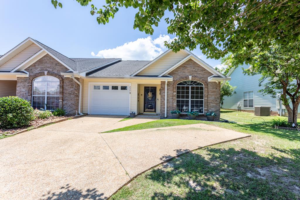 Carefree living at Huntington Pointe! Rare opportunity to own a low-maintenance townhome in the beautiful lakefront neighborhood, within walking distance of popular restaurants, recreation and shopping. The unique home is one of a few in the development that has additional parking in addition to the garage. Only a very small step to enter and exit makes accessibility easy and safe! Yard maintenance and even exterior pressure washing is all taken care of by the homeowners association, which makes this spacious and bright 2/2 1,664 Sq. Ft. home even more enjoyable. Once inside, the split  bedroom plan offers privacy, along with kitchen and two separate living areas. Space allows for additional formal dining or entertaining space. Main family room area offers the cozy ambiance of an electric fireplace, with an additional living space attached that includes a four-season sun porch, which could double as a home gym, office, or pet retreat. Luxury primary bedroom with ensuite bath, featuring spacious counter space and a built-in makeup vanity. Secondary bedroom is also spacious allowing room for a dresser, desk, and other furnishings. Set in a quiet enclave of cul-de-sac streets with community walking paths around the lake and clubhouse, this location is perfect to enjoy friends and neighbors in a secure setting. Some furnishings may be available.                        Seller is a GA-licensed real estate agent, inactive. Shown by appointment with notice, occupied.