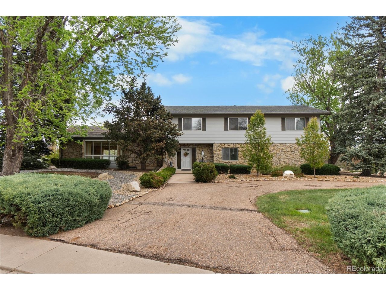 Positioned on a premium corner lot of over half an acre in unincorporated Arapahoe County, this custom-built home offers a rare combination of space, privacy, and opportunity, all within the highly sought-after Littleton Public Schools District 6 and a lower tax base. Built with deep caissons and thoughtfully maintained, the home features a Decra stone-coated steel roof with a lifetime warranty, recent exterior paint, and no history of basement flooding. Expansive windows and open sightlines create a bright, airy interior with open eastern views, allowing you to take in sunrises in the morning and moonrises in the evening, with no close neighboring homes, enhancing the sense of space and privacy. A standout feature is the separate office wing with private access, including direct garage ingress and its own exterior entry, offering exceptional flexibility for a home-based business, multigenerational living, or private suite conversion. The generous lot provides room to expand, enhance outdoor living, or simply enjoy the setting.With strong structural fundamentals already in place, this property presents a compelling opportunity for updates or remodeling to build equity while tailoring the home to your vision. Conveniently located near South Platte Park, Chatfield recreation, Aspen Grove shopping and dining, light rail access, and Historic Downtown Littleton. Across the street, Polo Reserve preserves open space and enhances long-term desirability.** There are more pictures and renderings for the home. Please reach out**