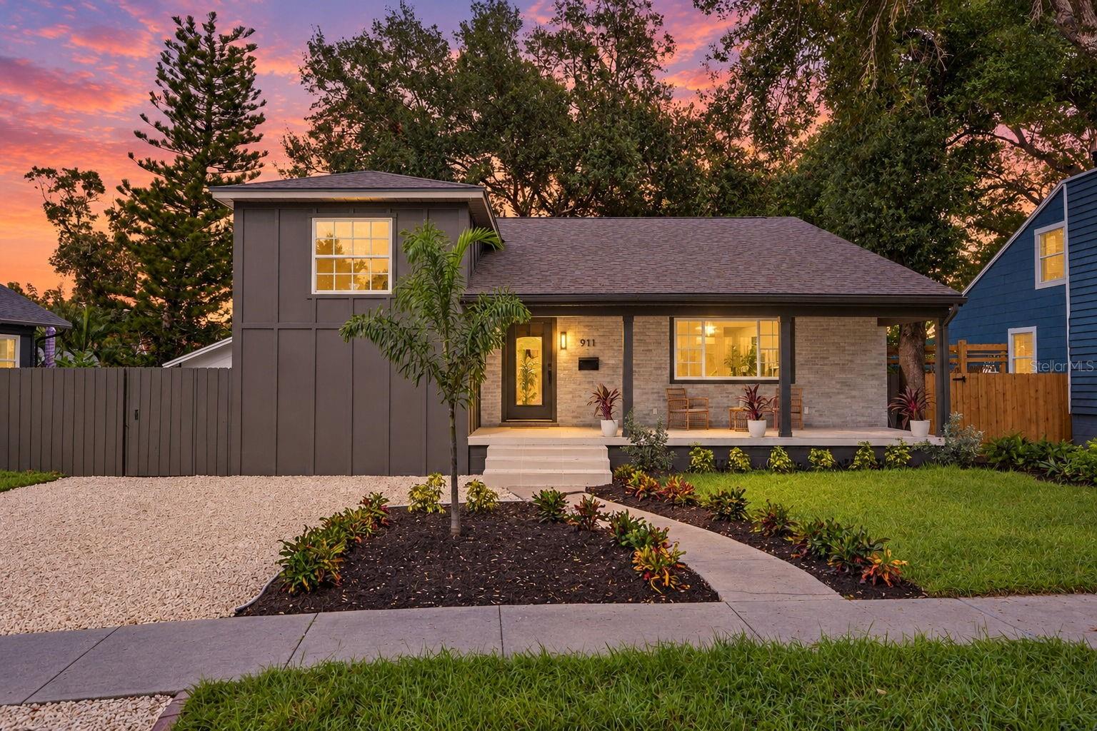 A four-level residence in North Kenwood is rare. One with a finished Florida basement complete with a private entrance and a finished attic bonus room is a once-in-a-generation find. Reimagined from top to bottom, this 5-bedroom, 3-and-a-half-bath home offers an exceptional sense of space, character, and flexibility, beginning with its distinctive brick façade, board-and-batten siding, manicured new landscaping, and tiled front porch beneath a richly finished tongue-and-groove ceiling. Inside, vaulted ceilings and exposed beams lend architectural drama, while new luxury vinyl plank flooring, recessed lighting, carefully selected fixtures, and subtly embellished tile stair risers create a refined sense of continuity. The kitchen balances beauty with everyday function: soft-close shaker cabinetry, stainless steel appliances, a gas range, wine refrigerator, and a dedicated coffee bar framed by designer floating shelves. The primary suite is a retreat of its own, with a custom walk-in closet and an ensuite bath featuring a floating double vanity, floor-to-ceiling tile, and a generous shower with a rainfall head, handheld wand, and built-in bench. A moody, color-drenched powder room adds another memorable design moment and dares to be your favorite room in the entire residence. The finished Florida basement offers remarkable versatility for guests or multigenerational living, with its own entrance, walk-in shower, refrigerator and freezer, range, butcher-block countertops, deep sink, and soft-close cabinetry. On the fourth level, a spacious bonus room with substantial closets invites use as a playroom, creative studio, or private escape. A covered back patio completes the outdoor setting. With all-new mini splits, newer double-pane windows and Eaton electrical panel, a Rheem electric tankless water heater, and so much more, this is a singular North Kenwood offering designed for buyers who value both distinction and possibility.