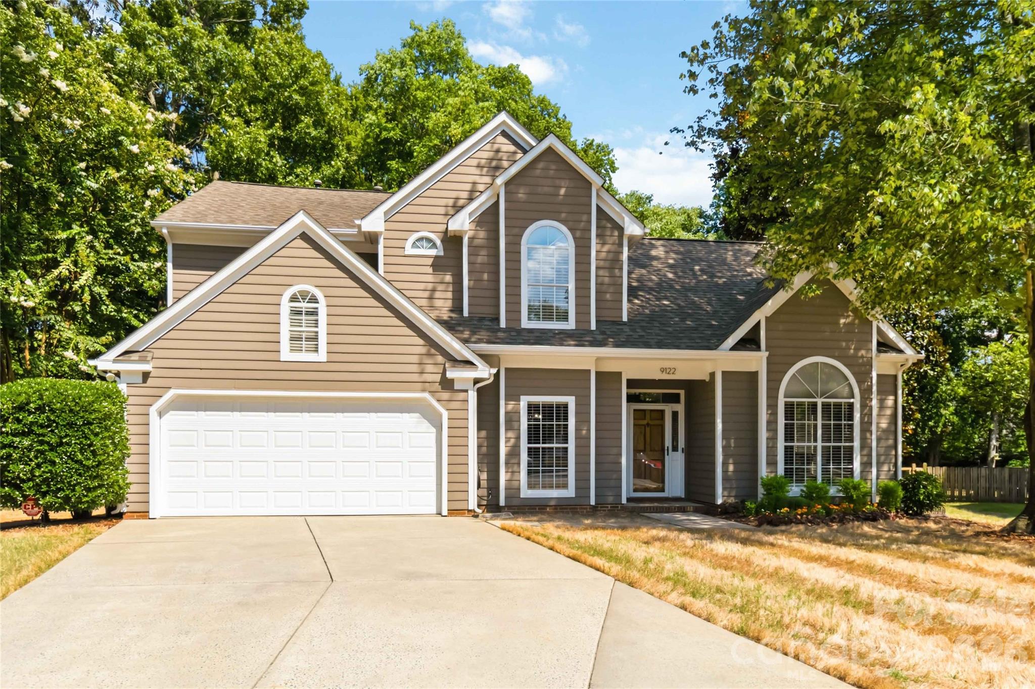 Welcome to this beautifully updated home nestled in a cul-de-sac on a large fenced-in lot. Exterior painted in 2025; home offers stylish updates and thoughtful detailsthroughout. New flooring throughout the home. No popcorn ceilings. The updated kitchen features granite countertops, new appliances, a beverage fridge,breakfast area, plenty of counter space to meal prep, and bar stools for entertaining. Dining room. The living room boasts cathedral ceilings and a brick fireplace.Woodburning or gas. The updated laundry rm includes a stackable washer/dryer setup allowing for extra workspace. Upstairs: 3 bedrooms, master with largebathroom, large soaking tub, walk-in tile shower. 2 additional bedrooms. All closets have custom shelving systems. Relax on the screened back porch overlookingprivate backyard. 2-car garage with ample storage and parking