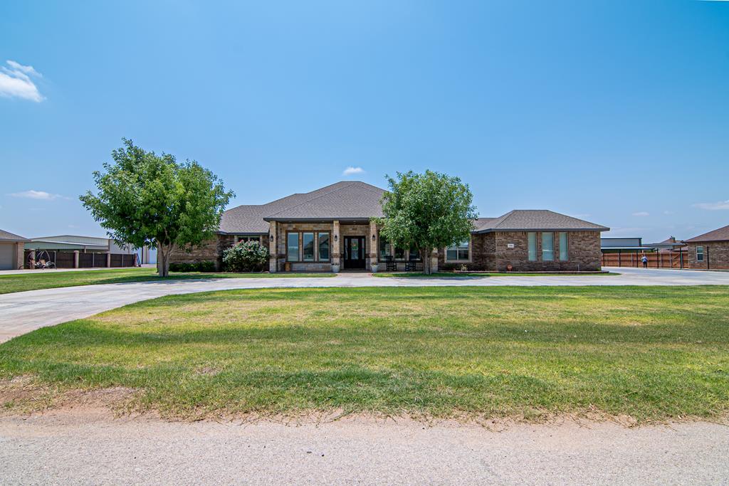 Welcome to your dream retreat in the heart of Chaney Ranch. This beautifully designed 4 bedroom, 3 bathroom blends luxury, comfort, and function in all the right ways.The spacious living area showcases elegant coffered ceilings, a stunning Austin stone fireplace, and panoramic views of your backyard oasis with pool for the ultimate bonus don't miss the brand new 40x60 shop! Fully foam insulated, climate controlled, and ready for anything whether it's a workspace, storage, or your next big hobby.